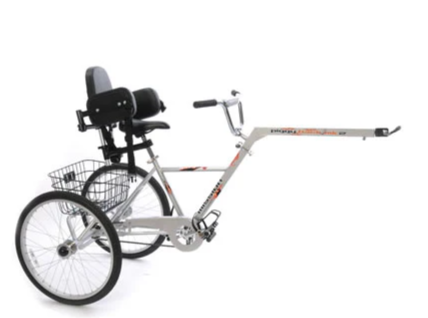A white custom wheelchair with a long arm extension and a built-in storage basket.