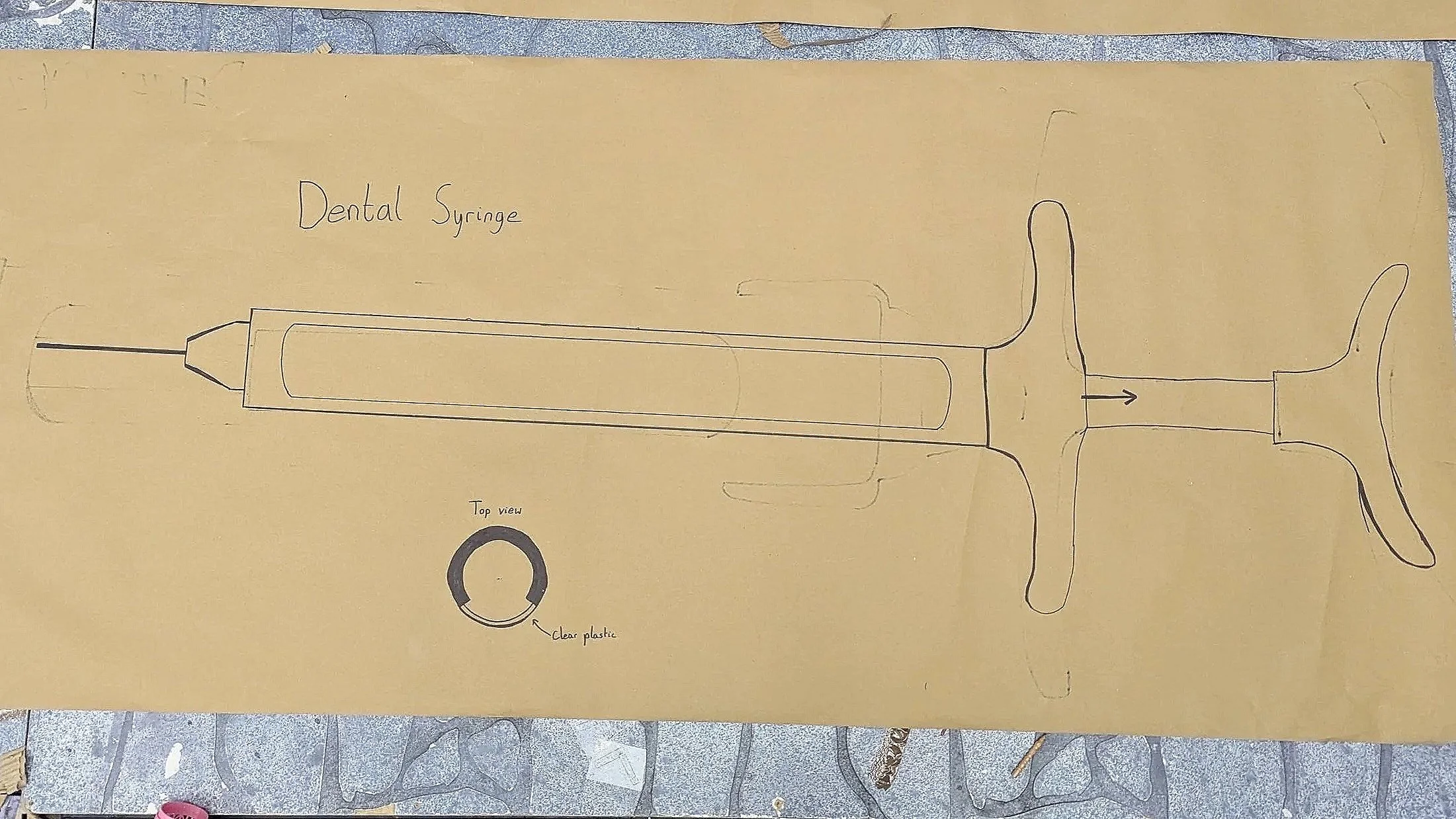 Scale drawing of giant dental syringe