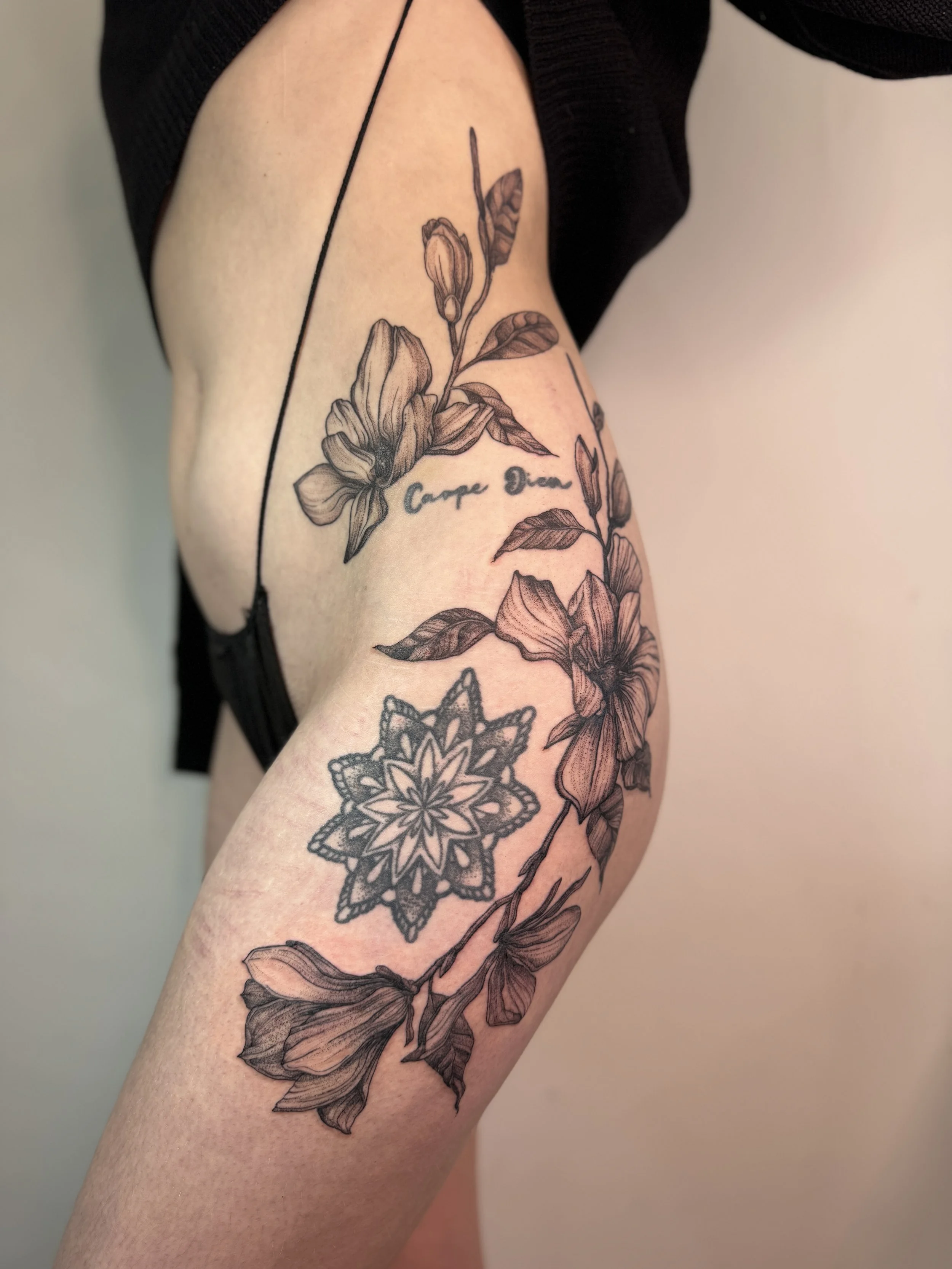 Botanical hip tattoo od magnolia flower. perfect gap filler to connect existing tattoos