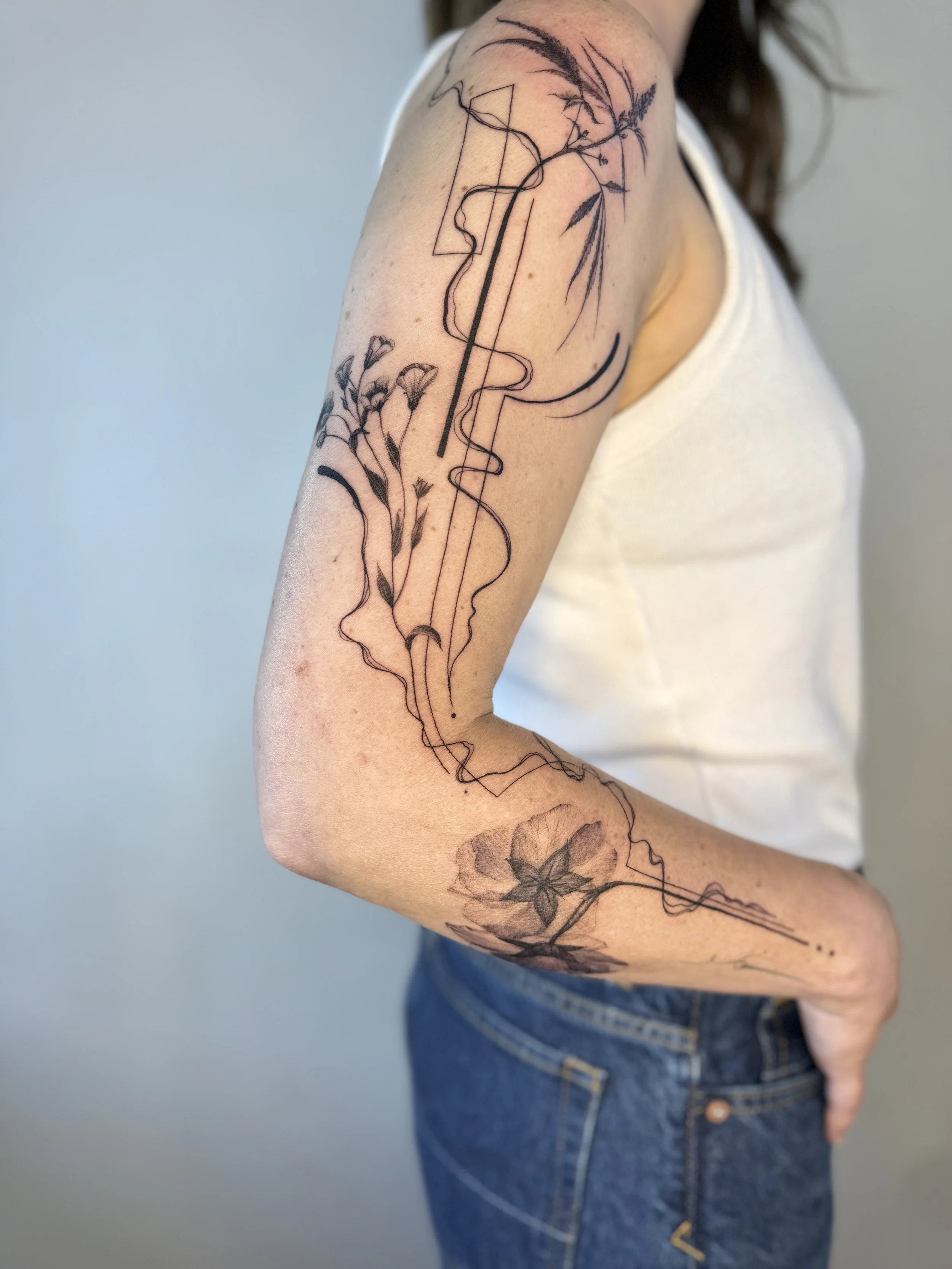 Botanical tattoo composition with fabric elements, cotton linen and hemp flower with Reach elements. Vanocuver abstract tattoo