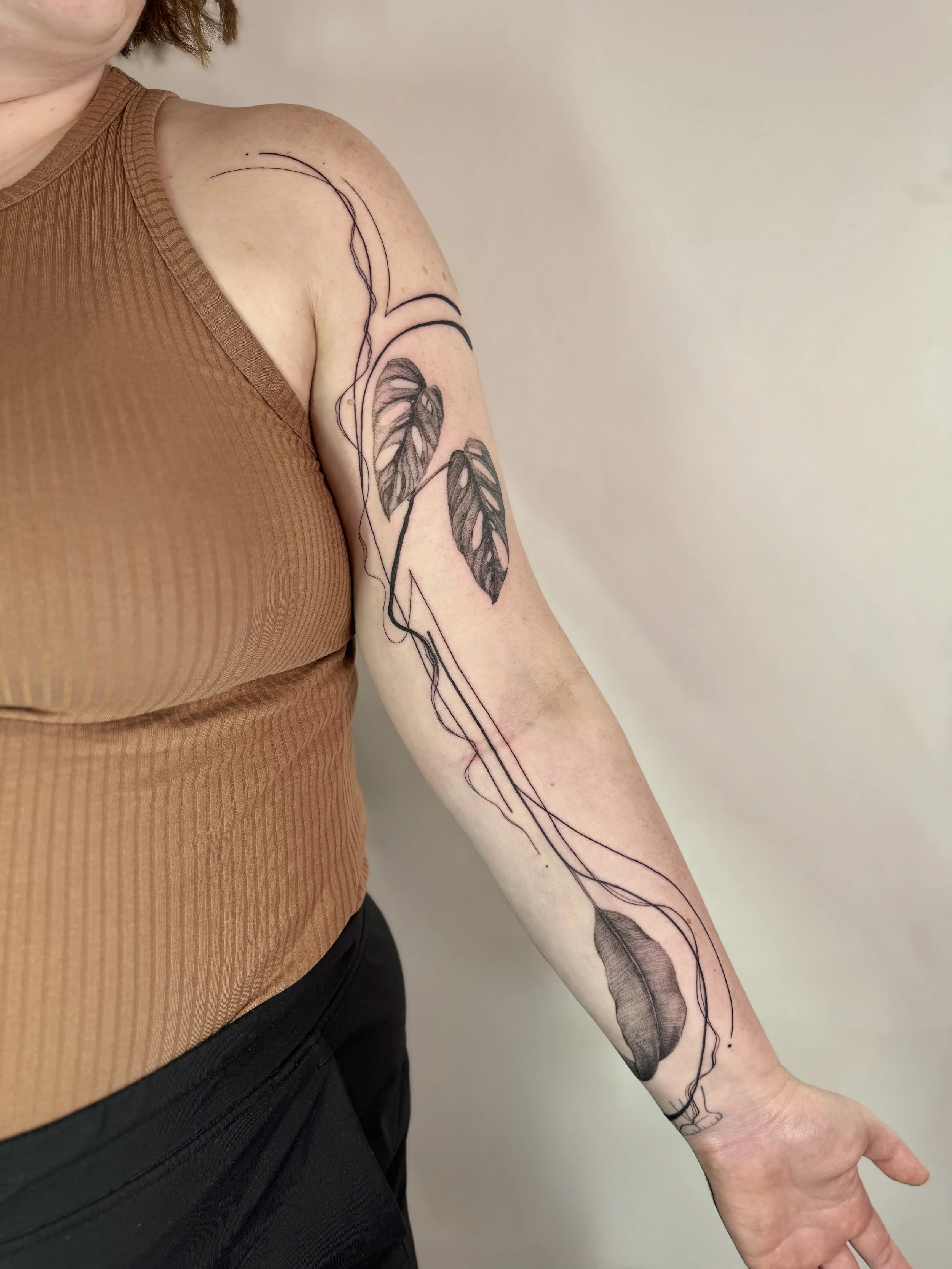 Abstract botanical flash tattoo design with Monstera leaves and abstract linework, fine line tattoo Vancouver