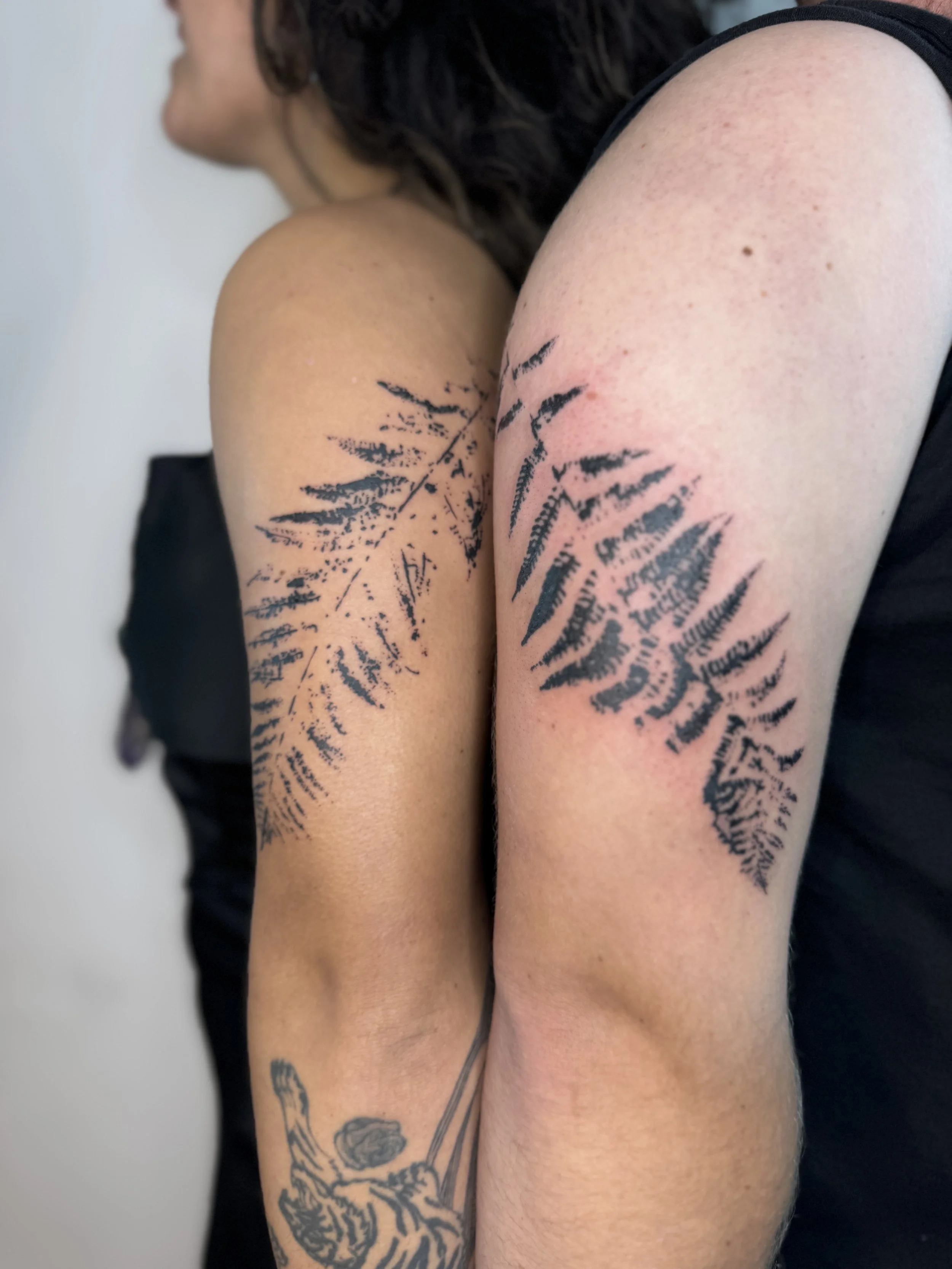 Fine line botanical tattoo inspired by real fen leaf imprint and natural textures, Vancouver. Petra Zakoucka is a tattoo artist