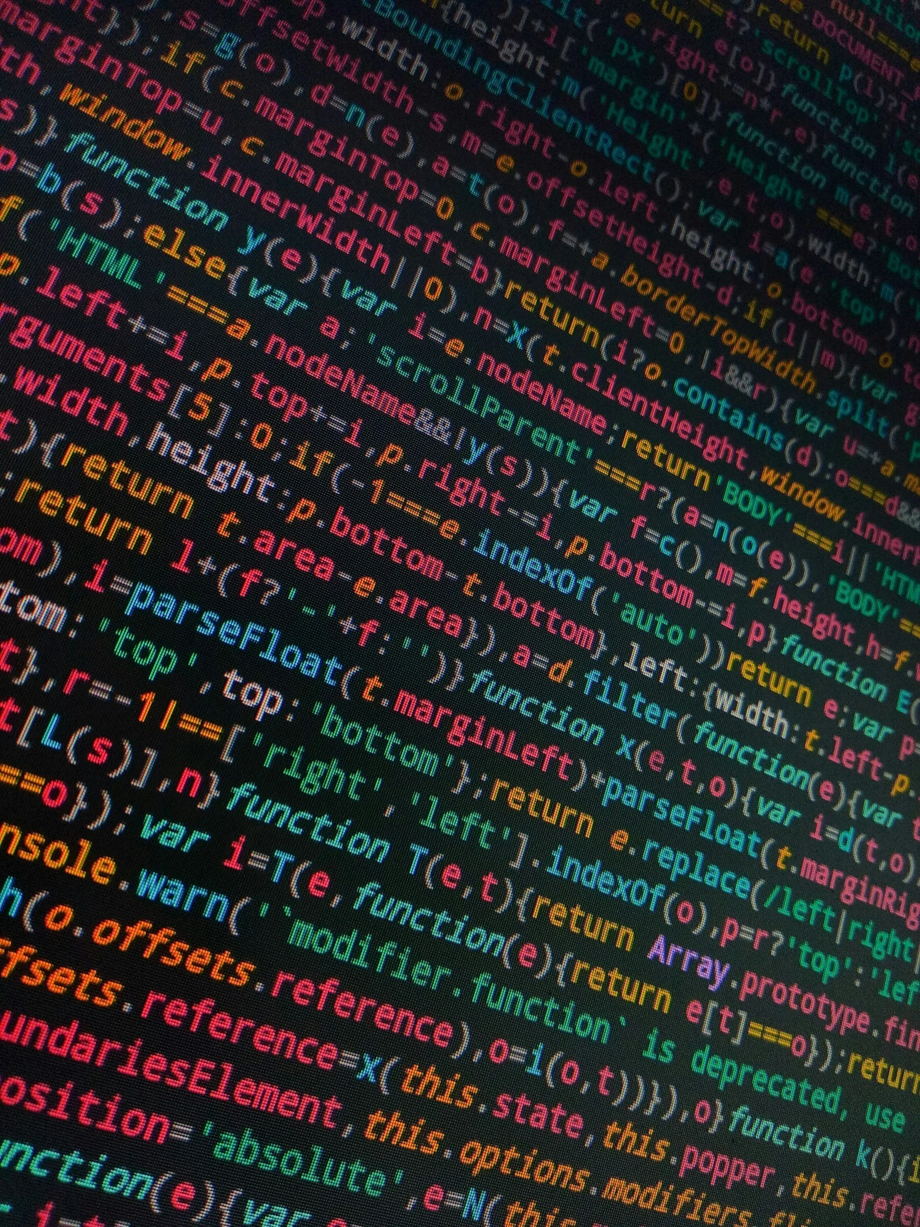 Close-up of colorful computer programming code on a screen.