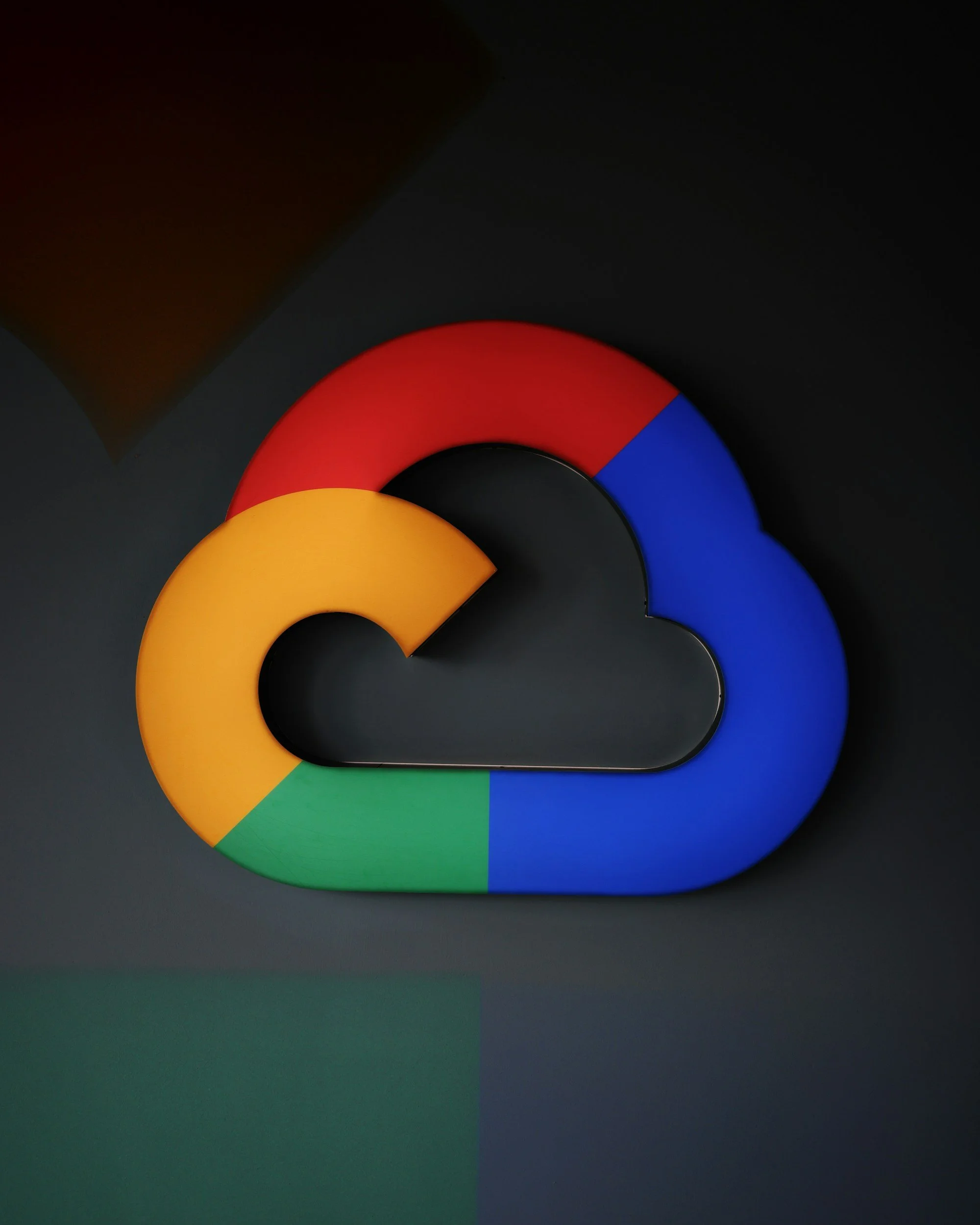 Google Cloud logo in the shape of a cloud with colorful sections.