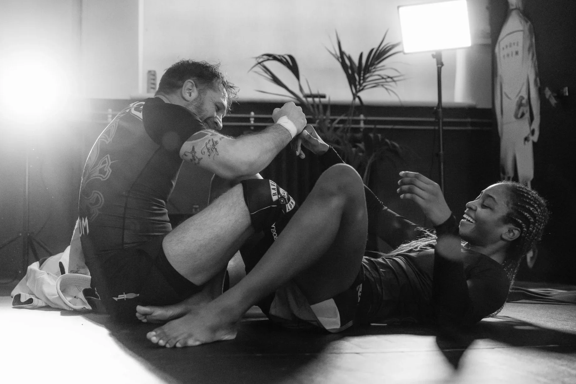 Tom Hardy Rolls with Shanelle Dyer - Two mixed martial arts fighters photographed ReOrg and Venom clothing. by James Bridle Photography Uk 