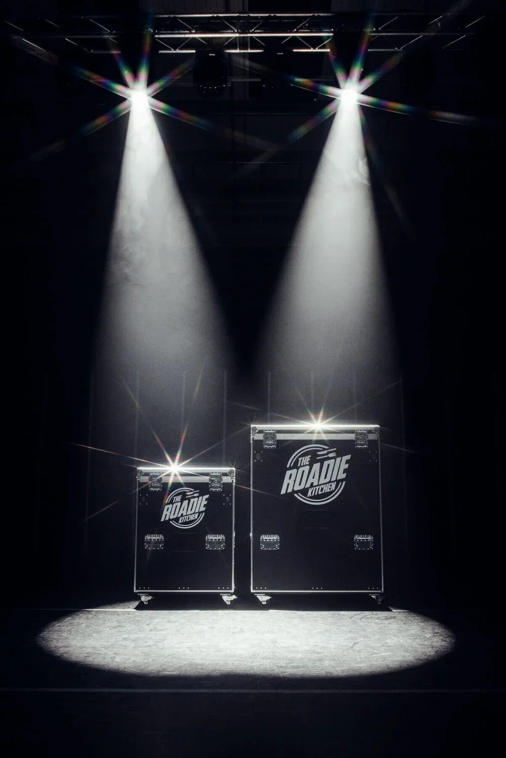 Roadie Kitchen commercial shoot. Two black equipment cases with Roadie Kitchen written on them. 