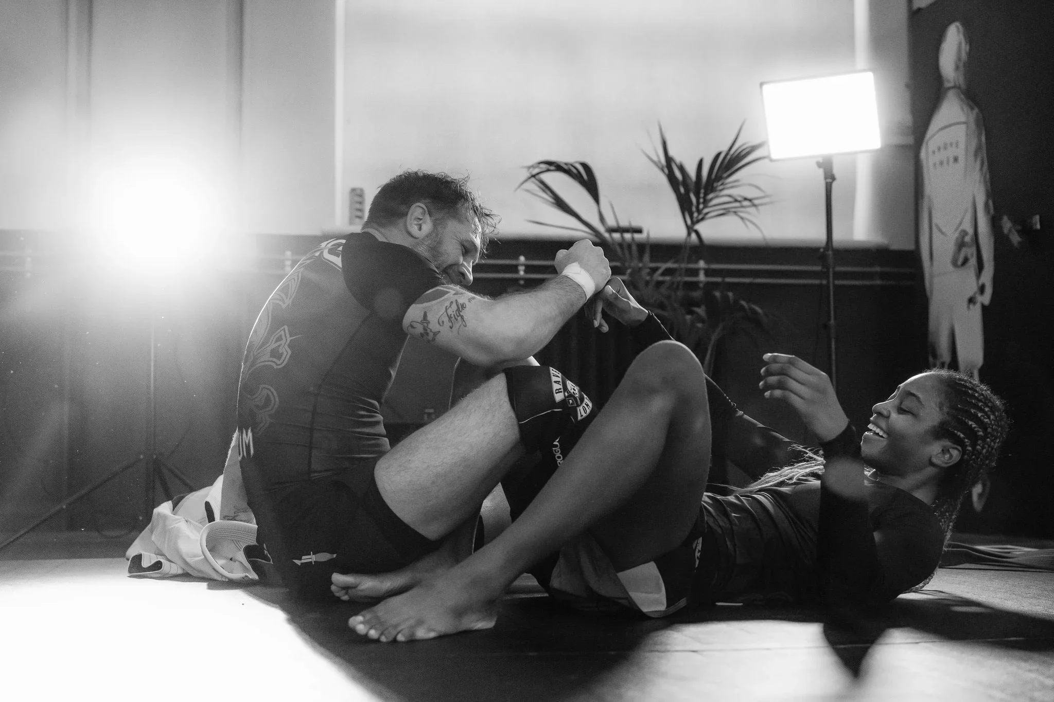 Tom Hardy Rolls with Shanelle Dyer - Two mixed martial arts fighters photographed ReOrg and Venom clothing. by James Bridle Photography Uk 