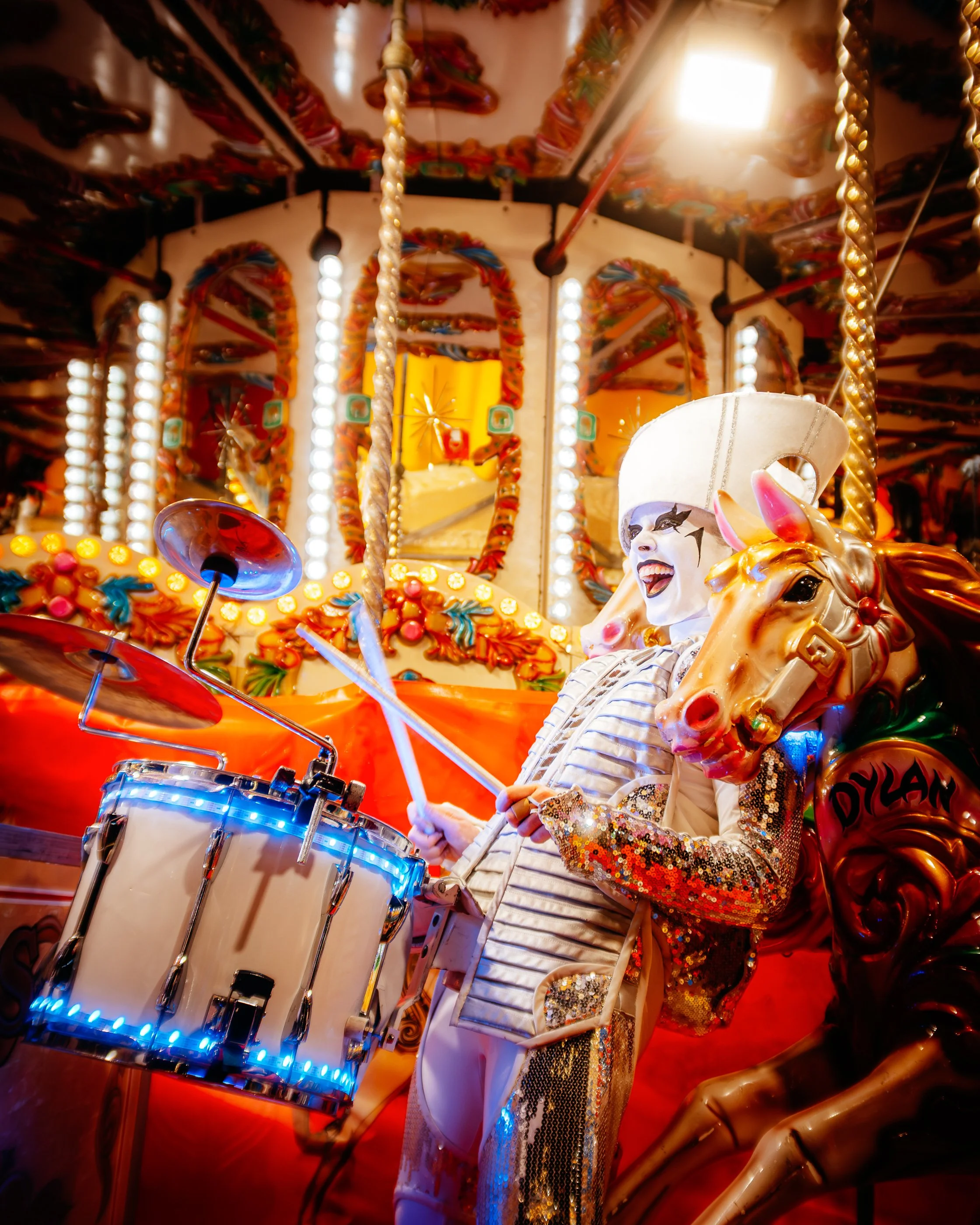 Performer at the Cambridge Christmas Market rides the Fairground at Christmas 2025 shot by James Bridle Photography 