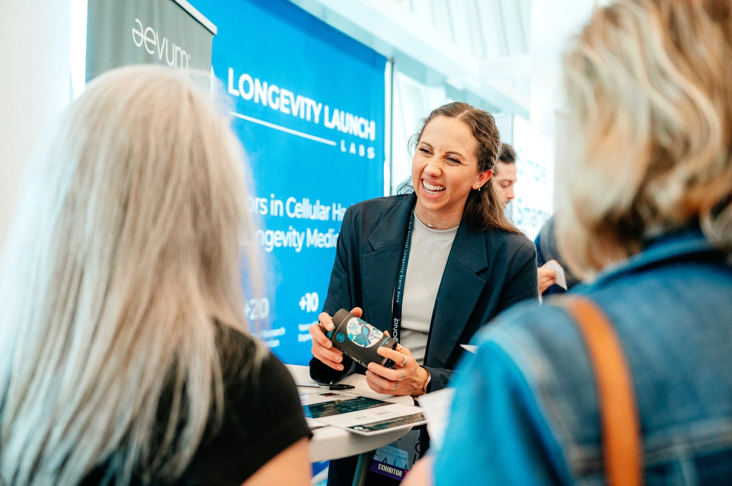 Medical Staff speaking at a conference engaging and smiling