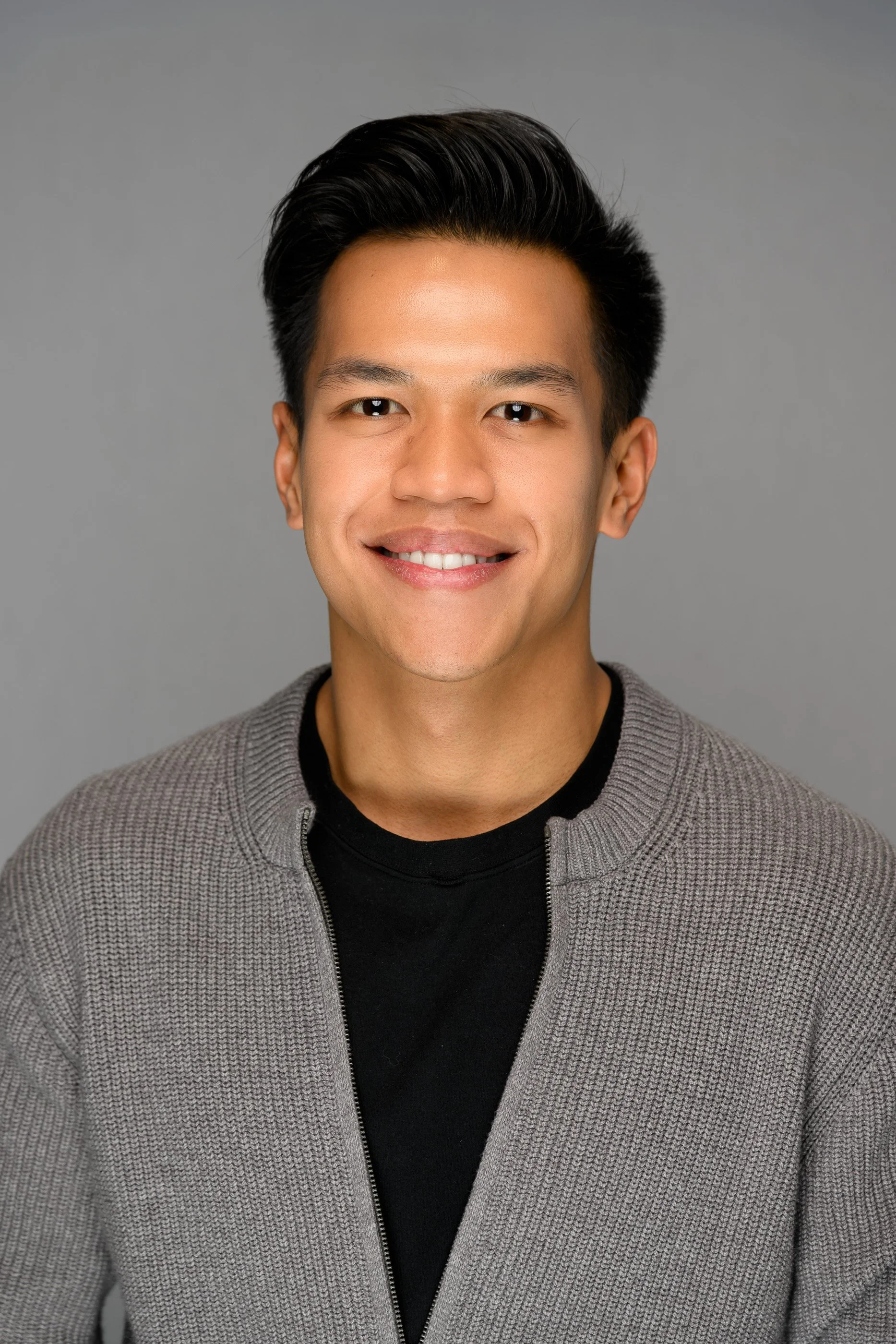 Headshot of an adult male at University Level