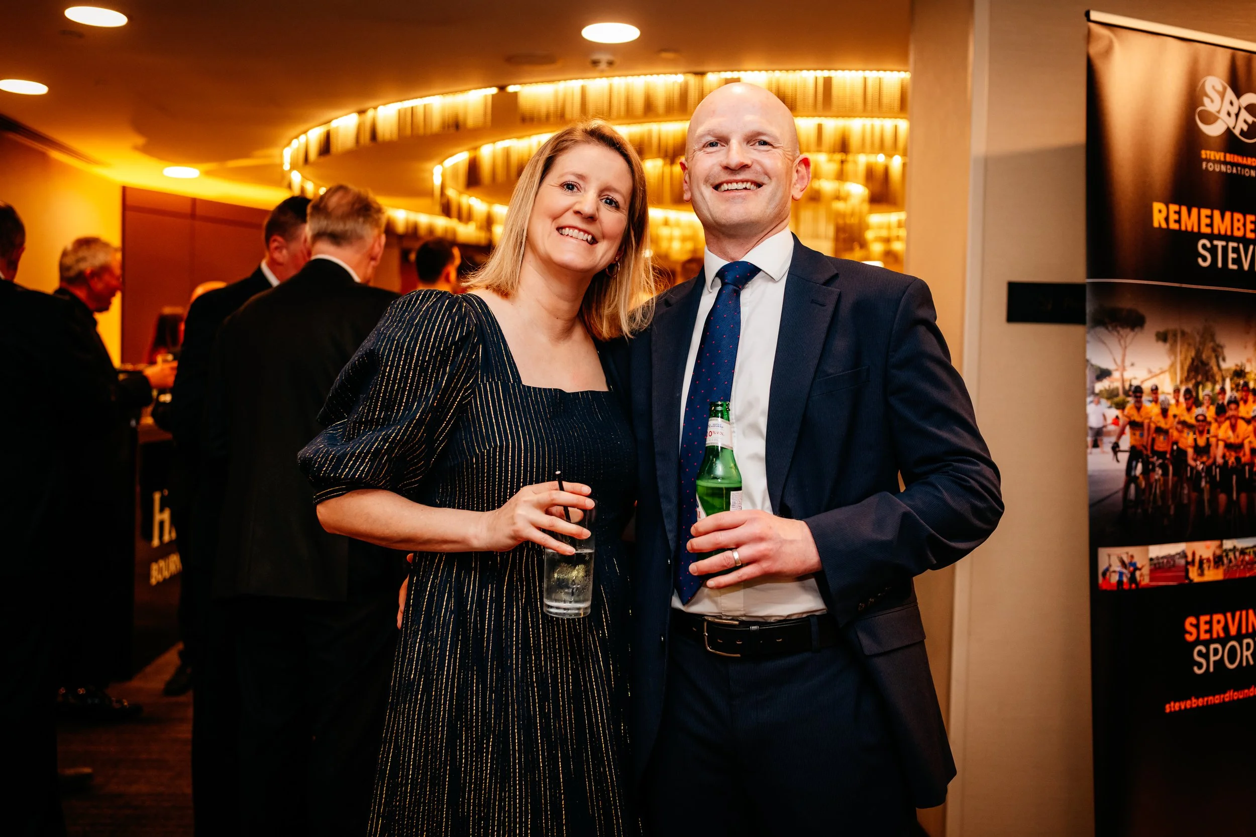 Couple smartly dressed at an evening celebration