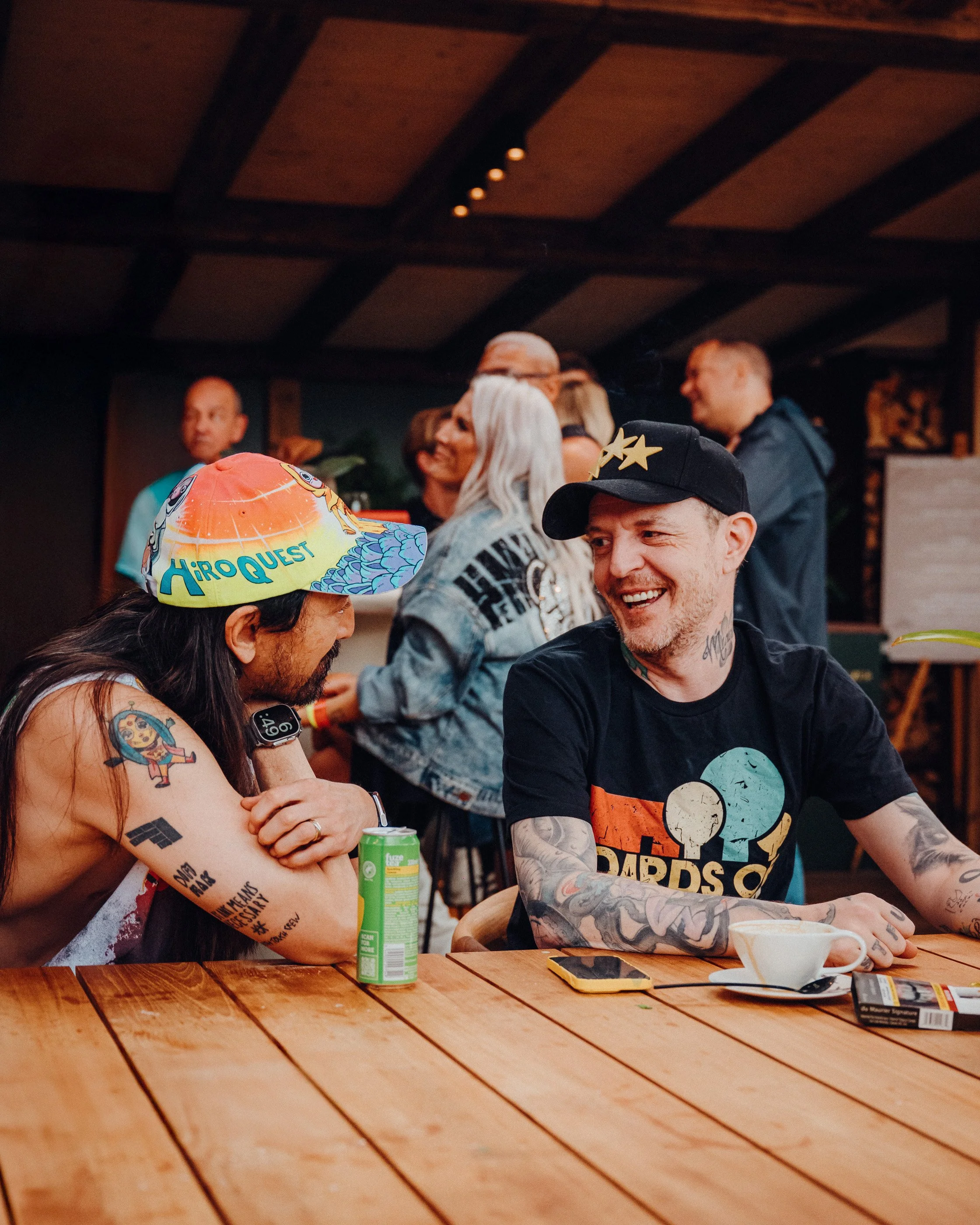 Steve Aoki (left) talking to Joel Thomas Aka DeadMau5 (right) at Tomorrowland Artist Village shot by James Bridle Music Photographer