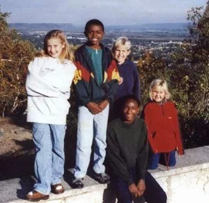 In 1999, Alex (2nd from left) and a friend stayed with a Minnesotan family for 3 days. 