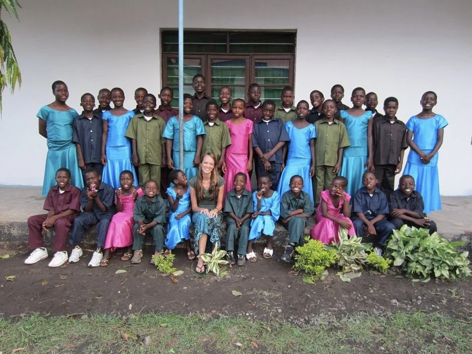 Brian's daughter with some of the students from her orphanage
