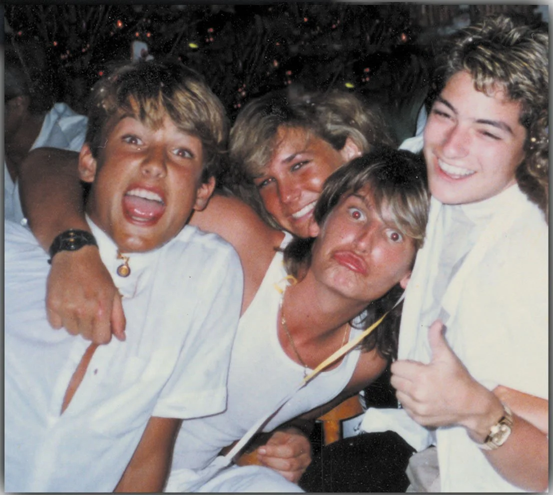 By middle school and high school Dean (right) was living in the world.