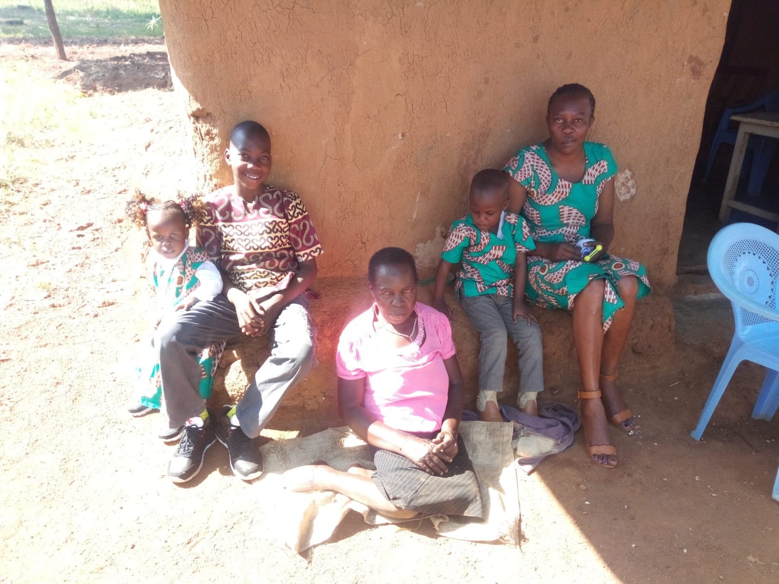 Family photo from approximately 5 years ago. James' mother is seated in the middle. James' late wife Mary is seated on the right.