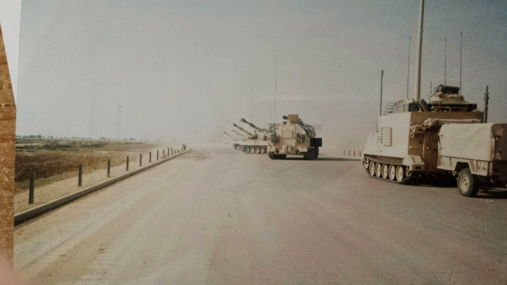 Providing artillery support for a task force under heavy enemy fire. Shortly after this picture, I had to run in behind those cannons to treat minor burns on soldiers who got too close to the cannons.