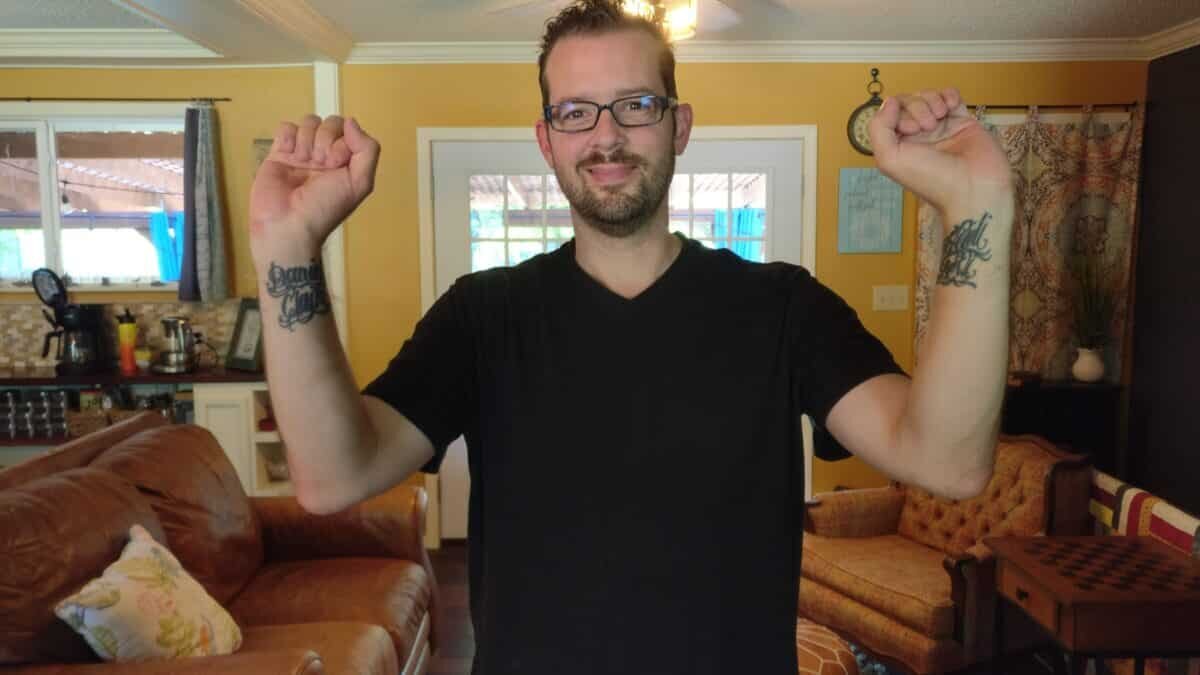 Julian Weber today, with his kid's names tattooed on his wrists