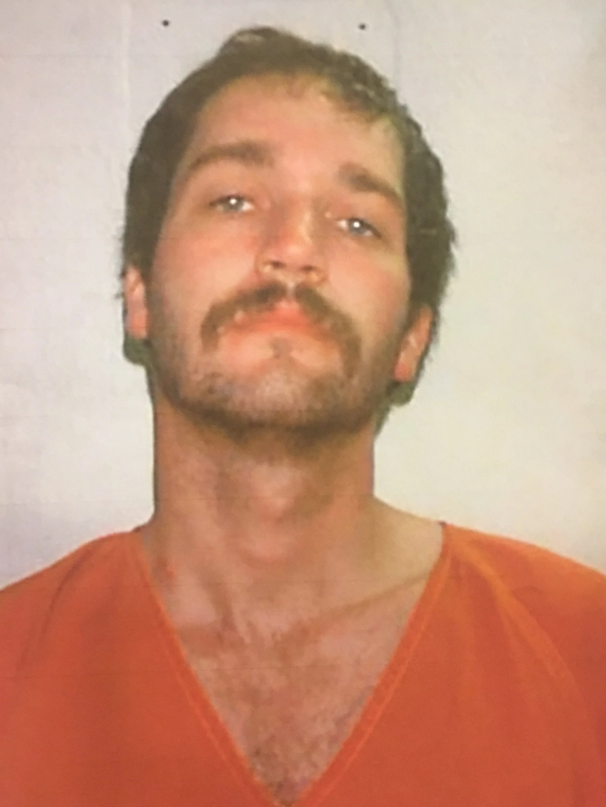 Ron's prison photo during the 1990s