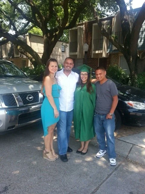 Melinda, Steven, Angelica (on her graduation day), and Steven Jr.