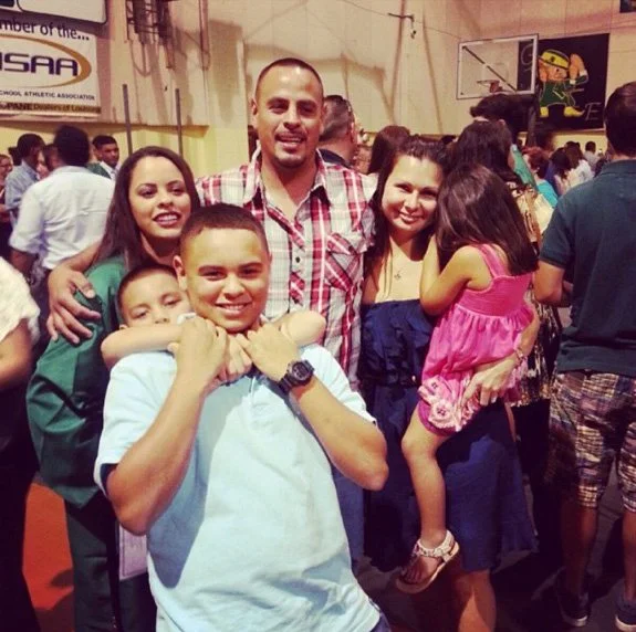 Angelica on her graduation day with Steven, Melinda, and her 3 siblings