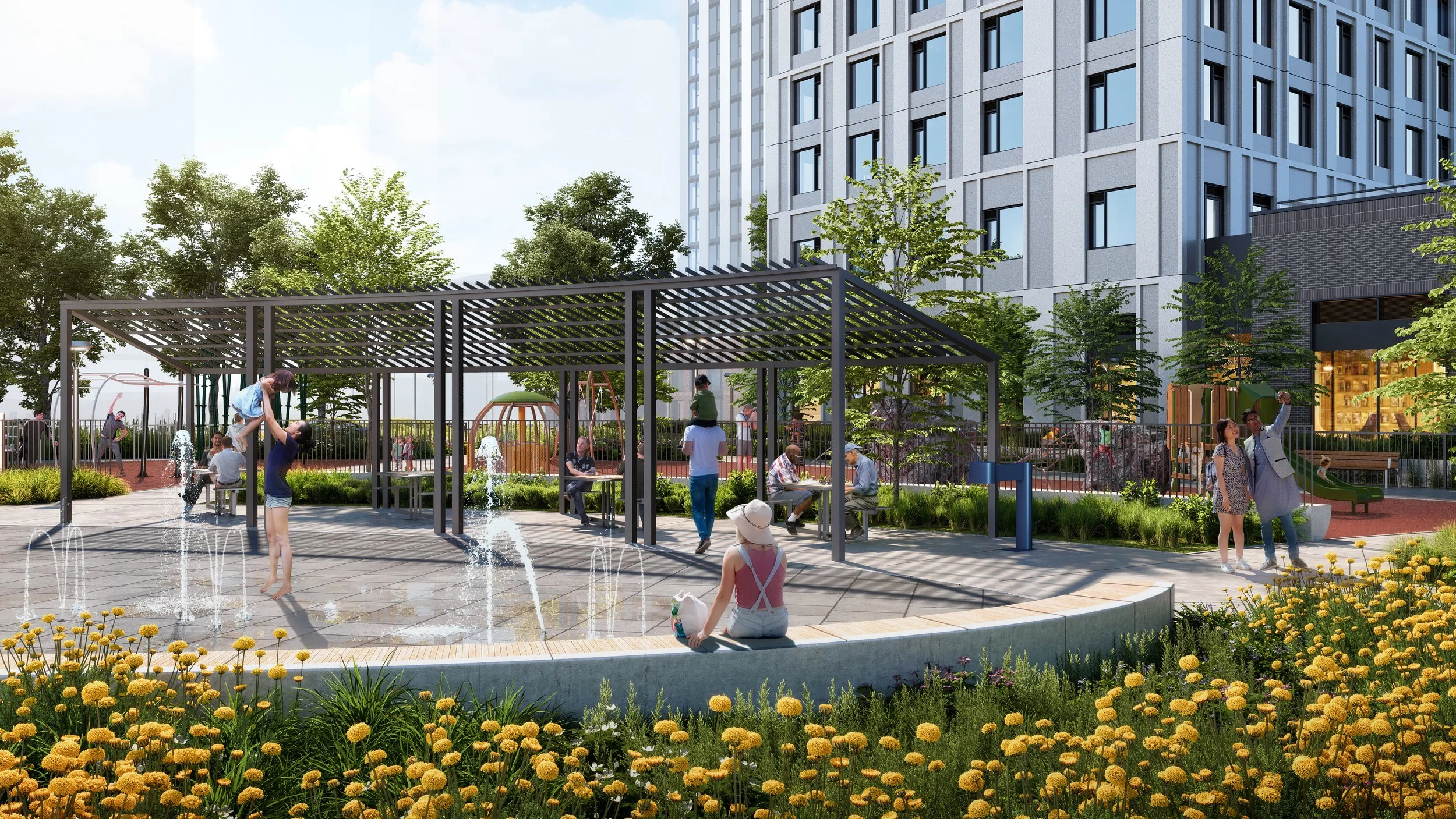 Children and adults enjoying a splash pad with fountains, in a landscaped outdoor urban park with trees, benches, and a modern high-rise building in the background.