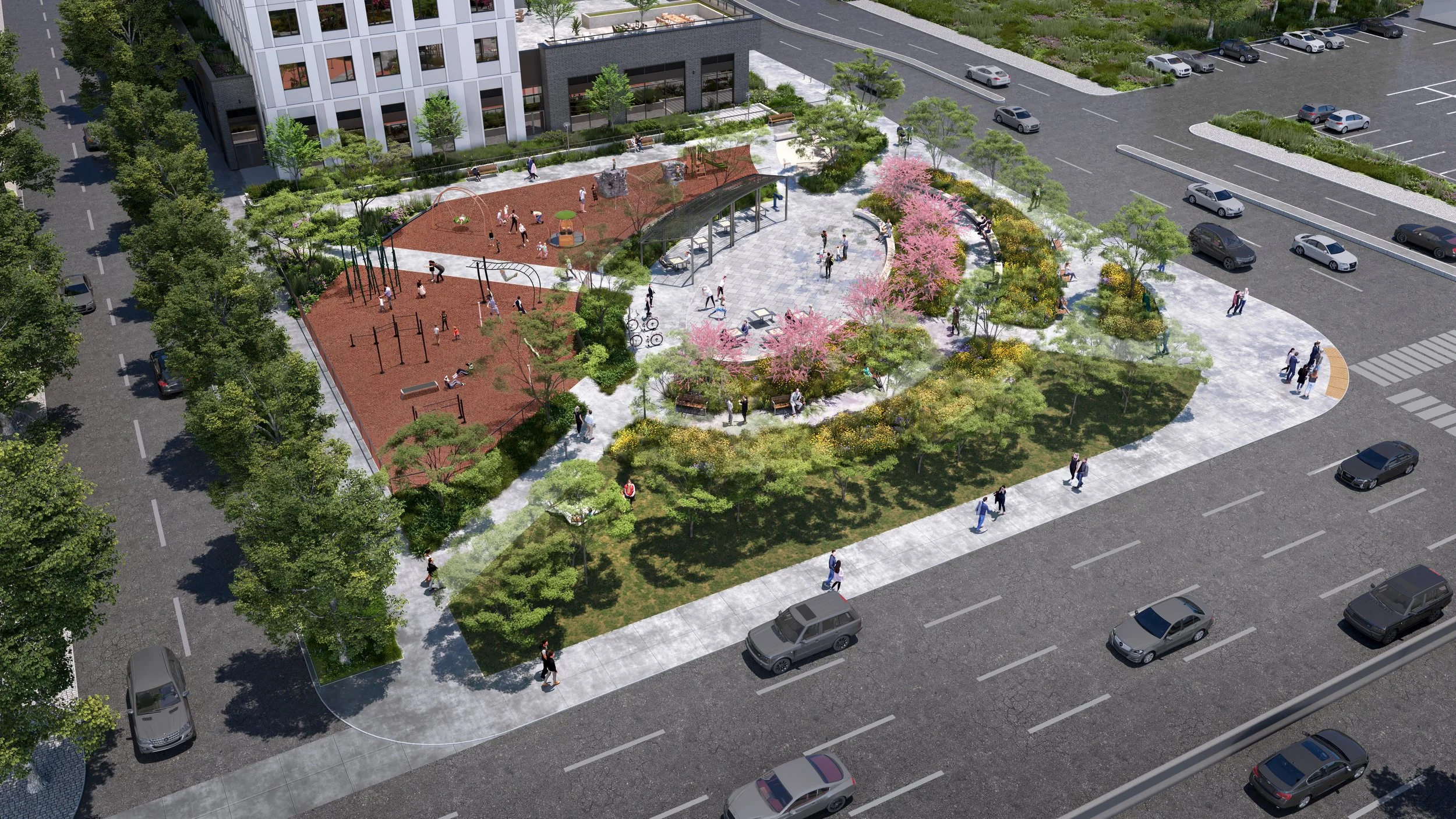 A park in an urban area with pathways, green trees, pink flowering trees, playground equipment, seating areas, and people walking, sitting, and playing, surrounded by parking lots and a multi-story building.