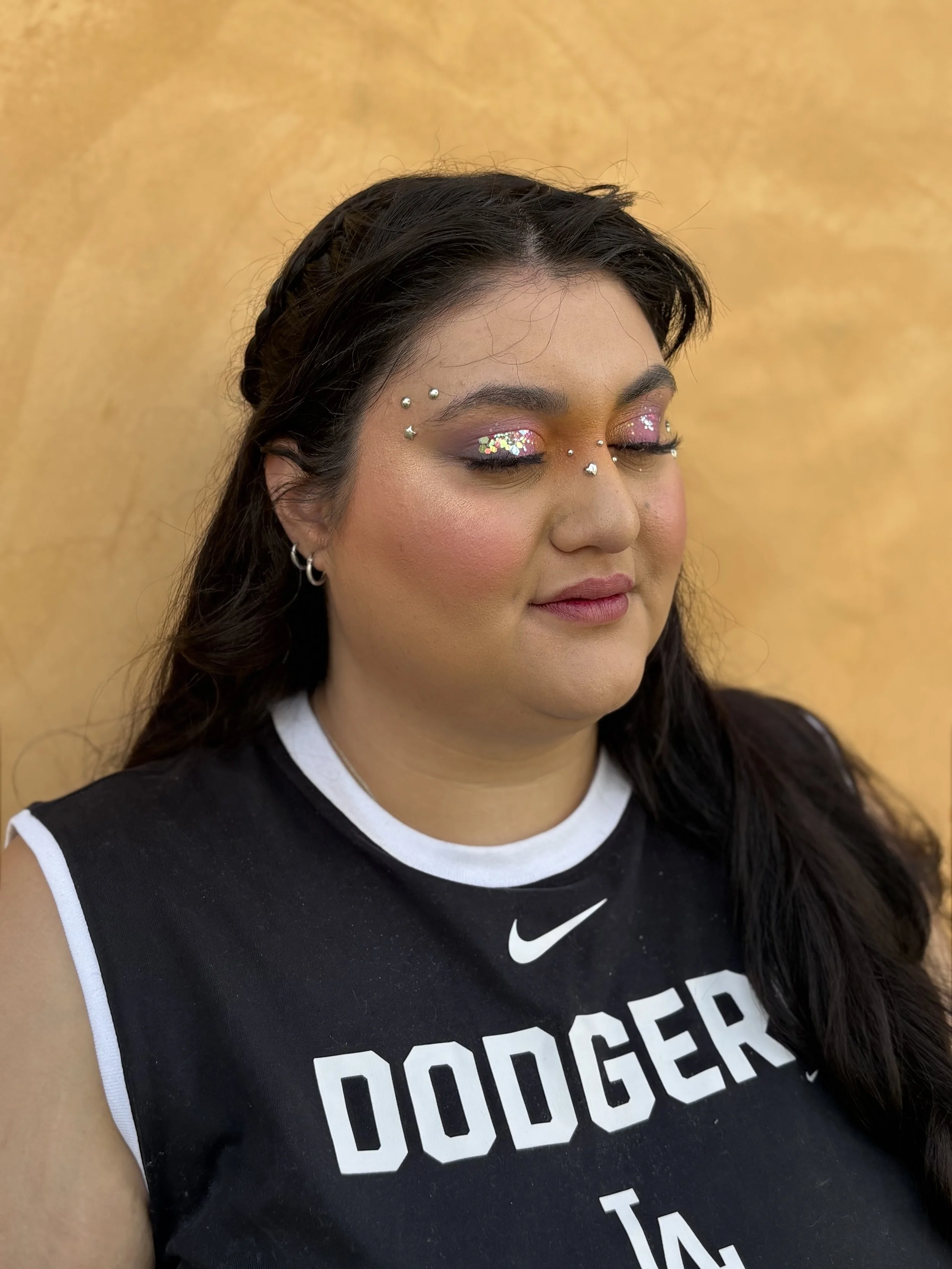 Makeup Application showcasing MODA brushes, Hair styled half up/half down