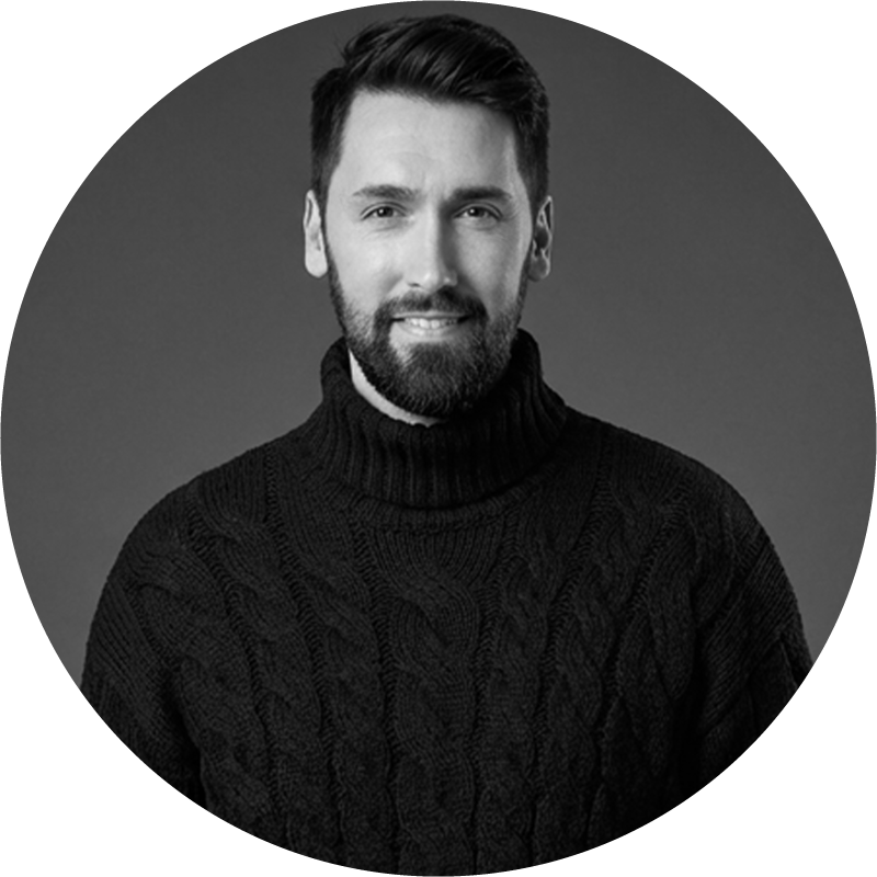 Black and white photo of Luc Dumais.