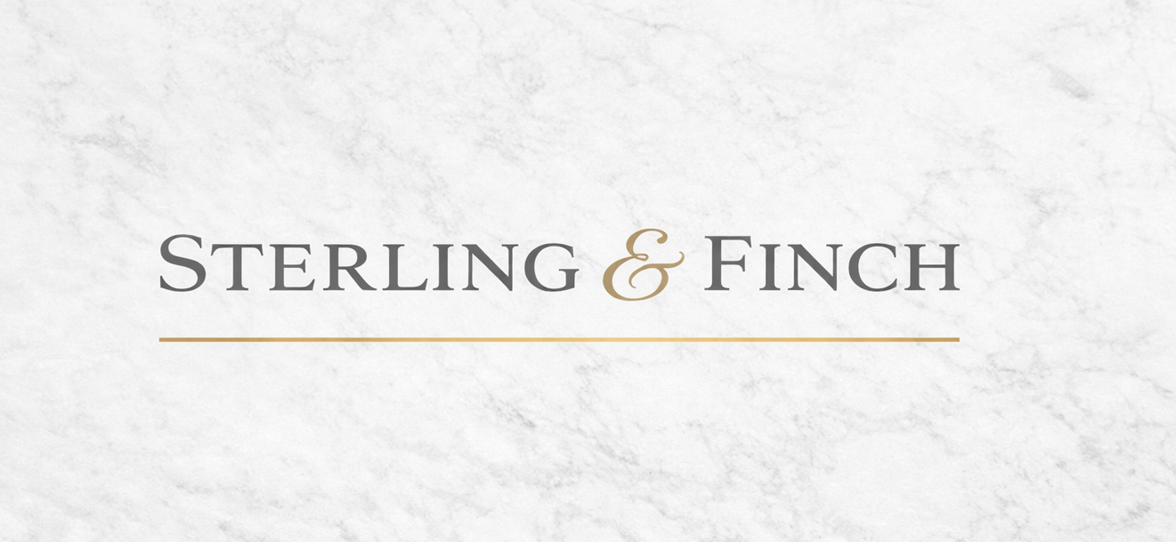 Logo with gray and gold text that reads 'Sterling & Finch' on a white textured background.