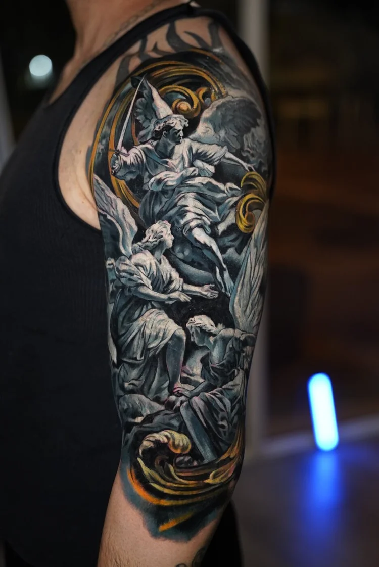 Angel upper-arm cover-up after two consecutive sessions completing the first layer.