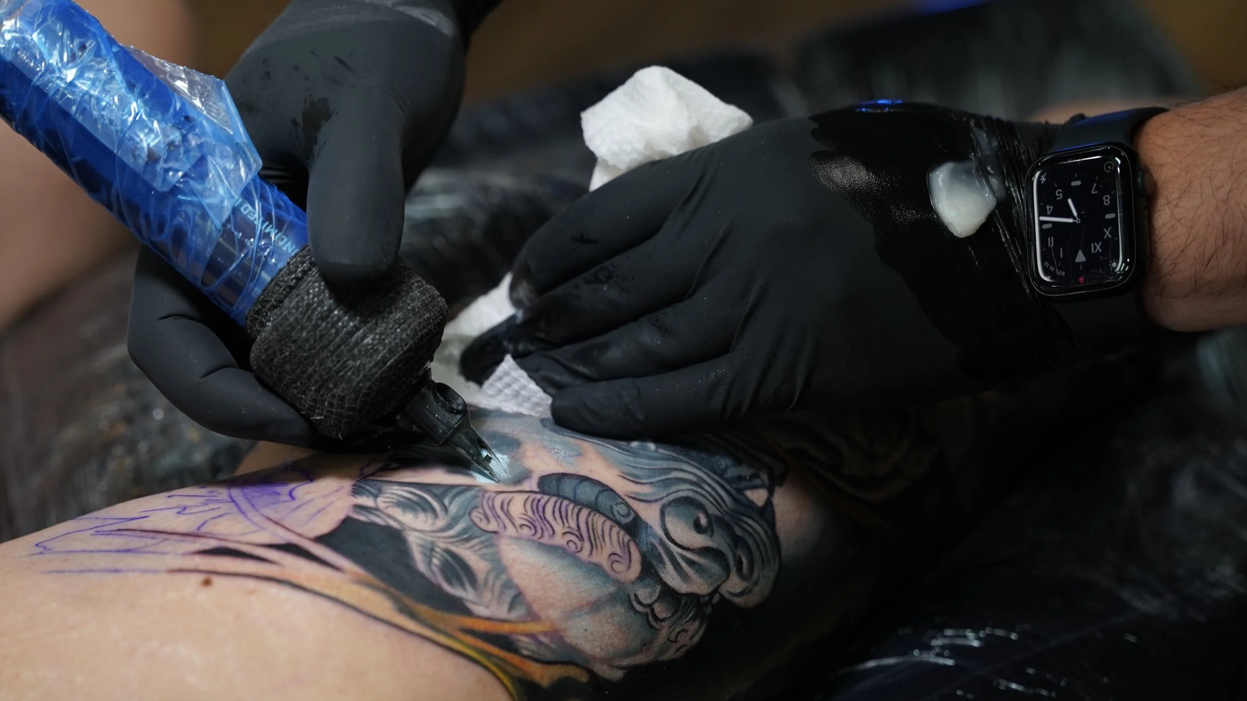 Close-up of a custom cover-up tattoo being completed at Black Nova Tattoo Collective in Miami, showcasing detailed realism and professional tattooing techniques.