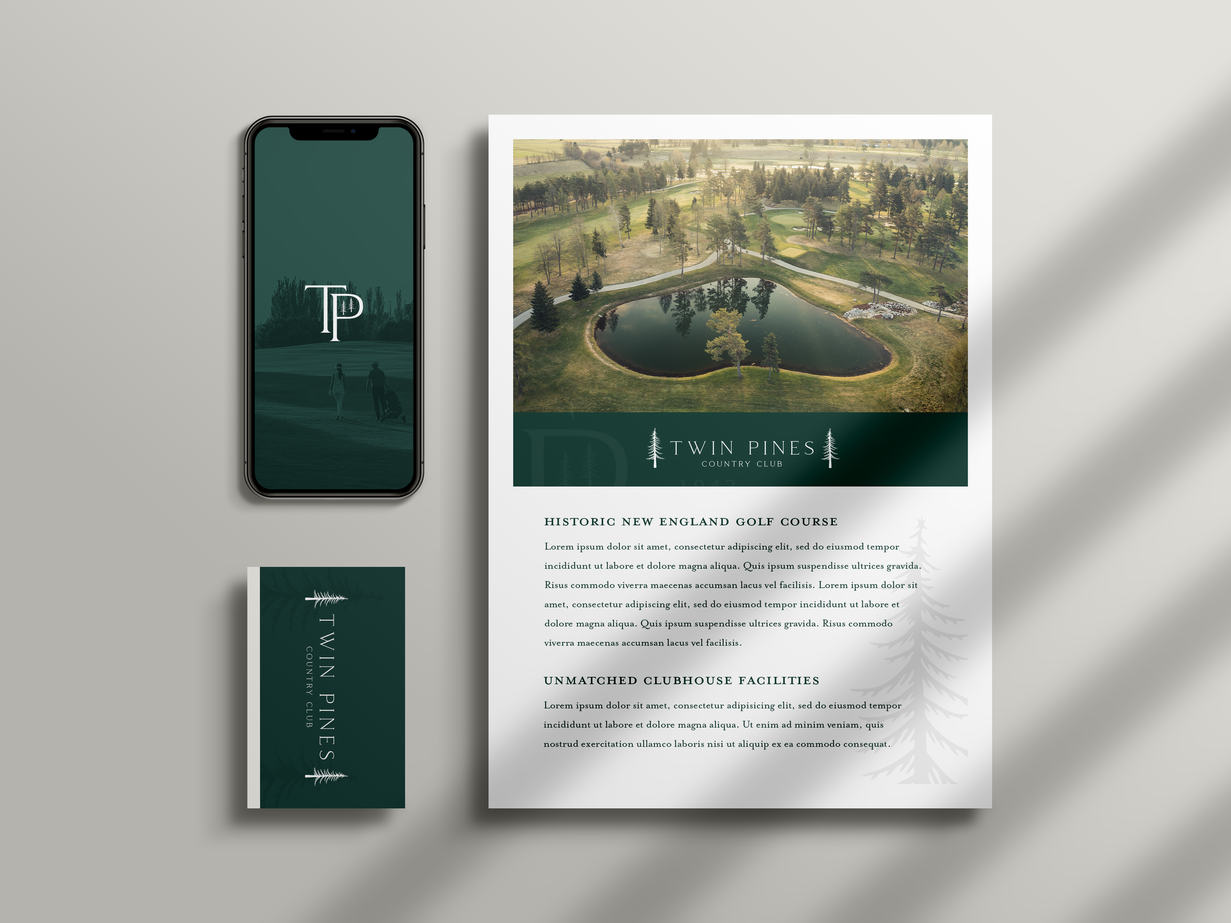 Promotional materials for Twin Pines Country Club, including a flyer with an aerial view of a golf course with trees and a pond, a smartphone displaying the Twin Pines logo, and a business card with the club's name and logo.