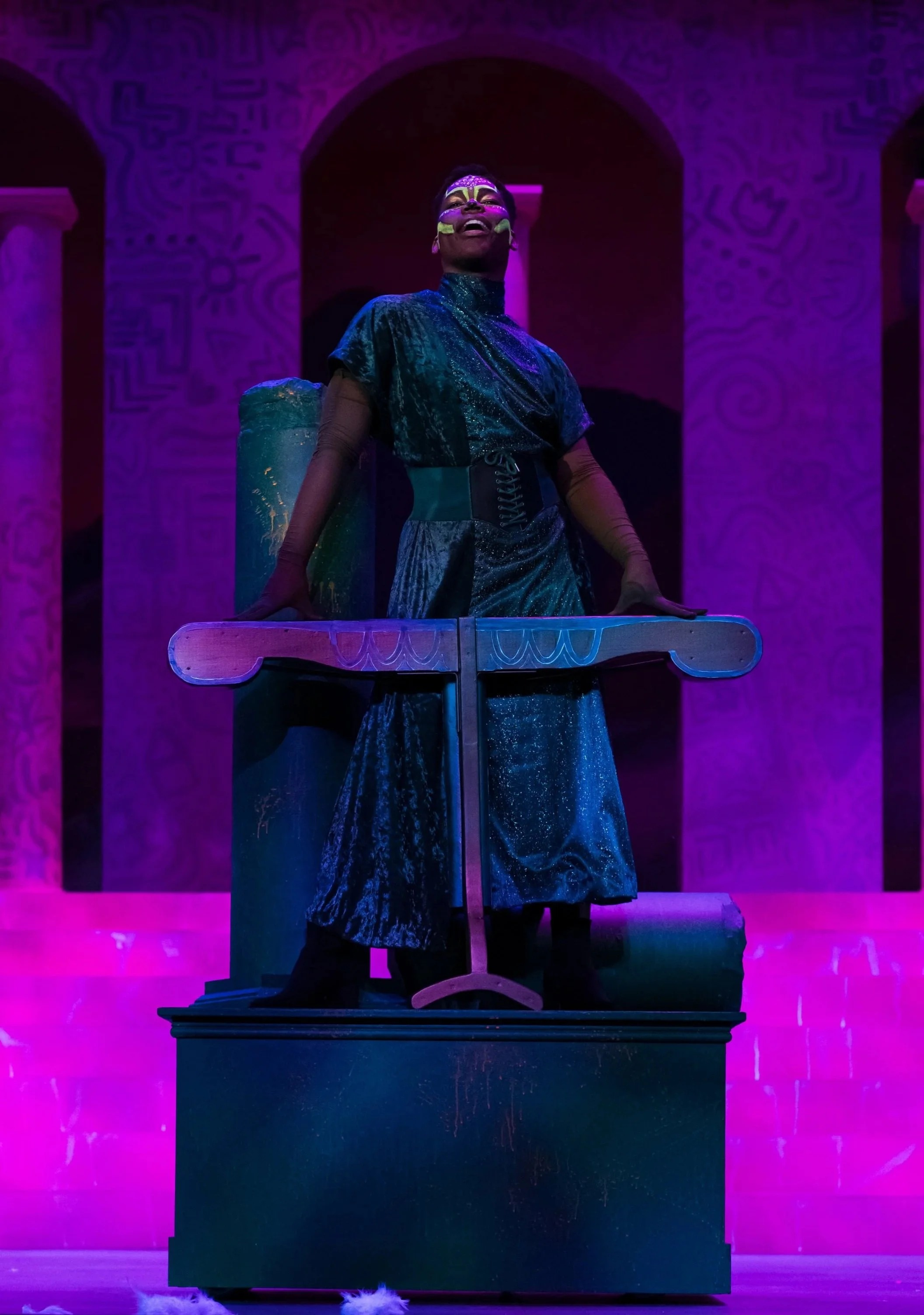 A green tunc flat patterned for a production of Head Over Heels.