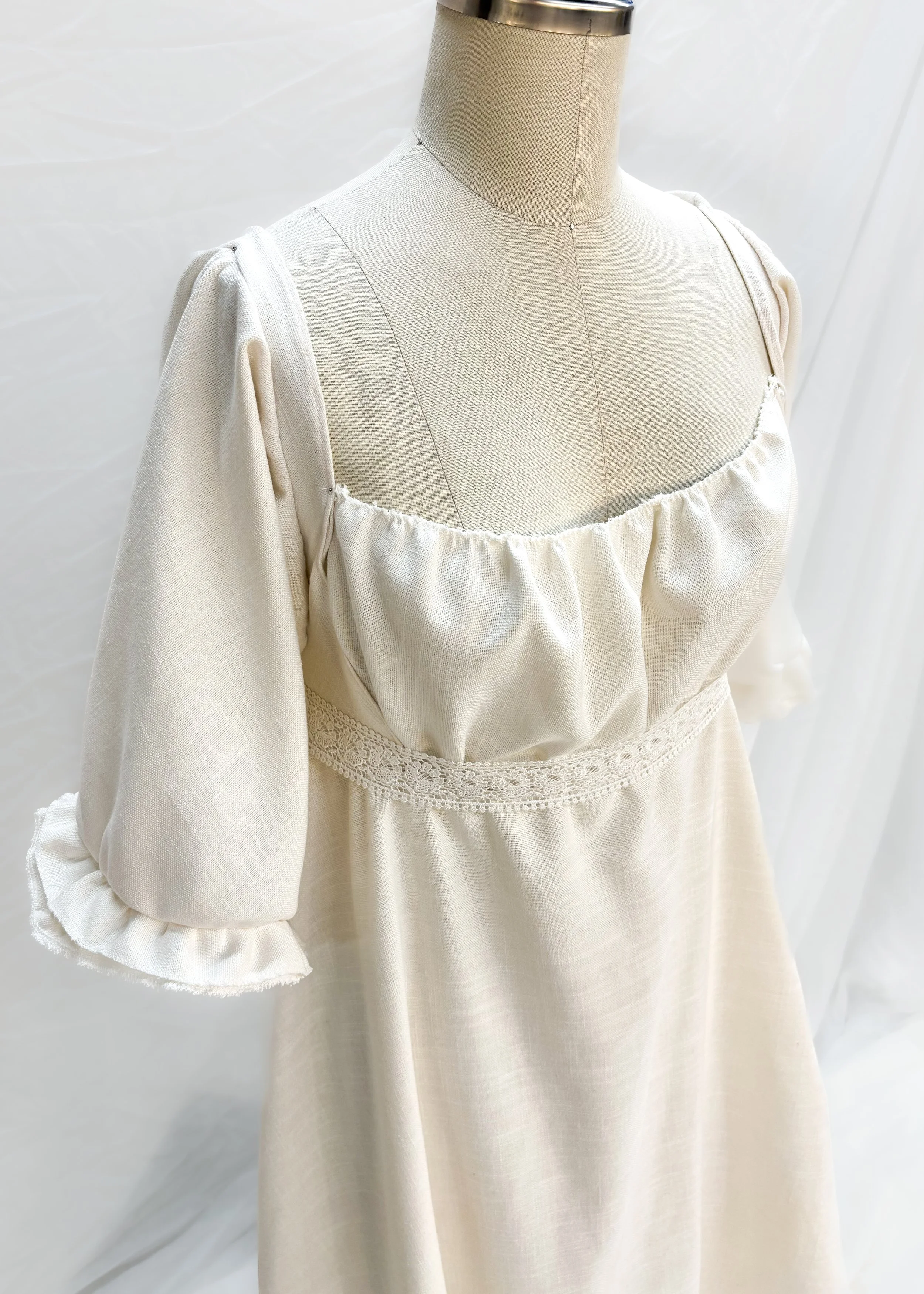A personal project of draping and construction based on an 1812 cotton linen evening gown.