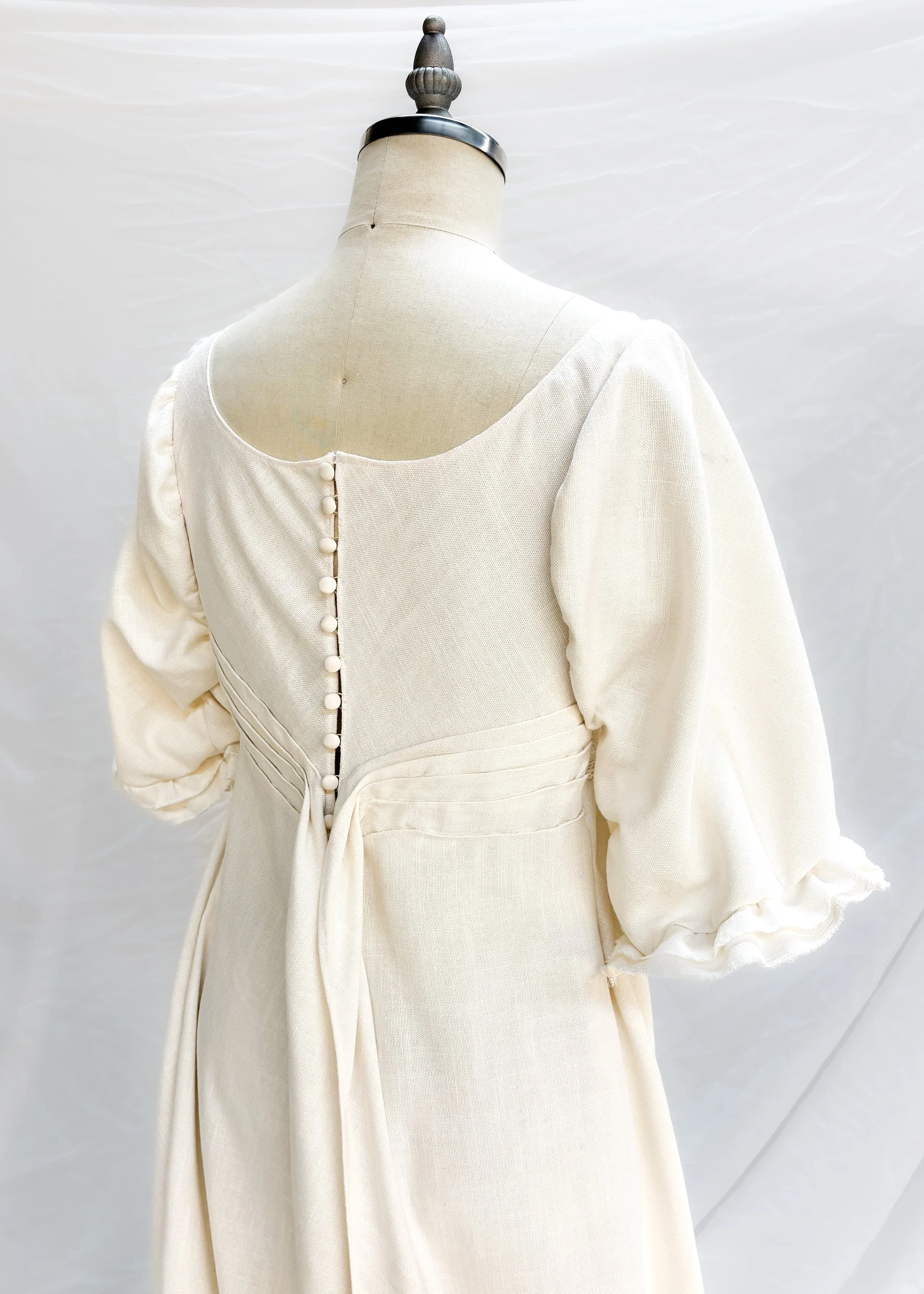 A personal project of draping and construction based on an 1812 cotton linen evening gown.