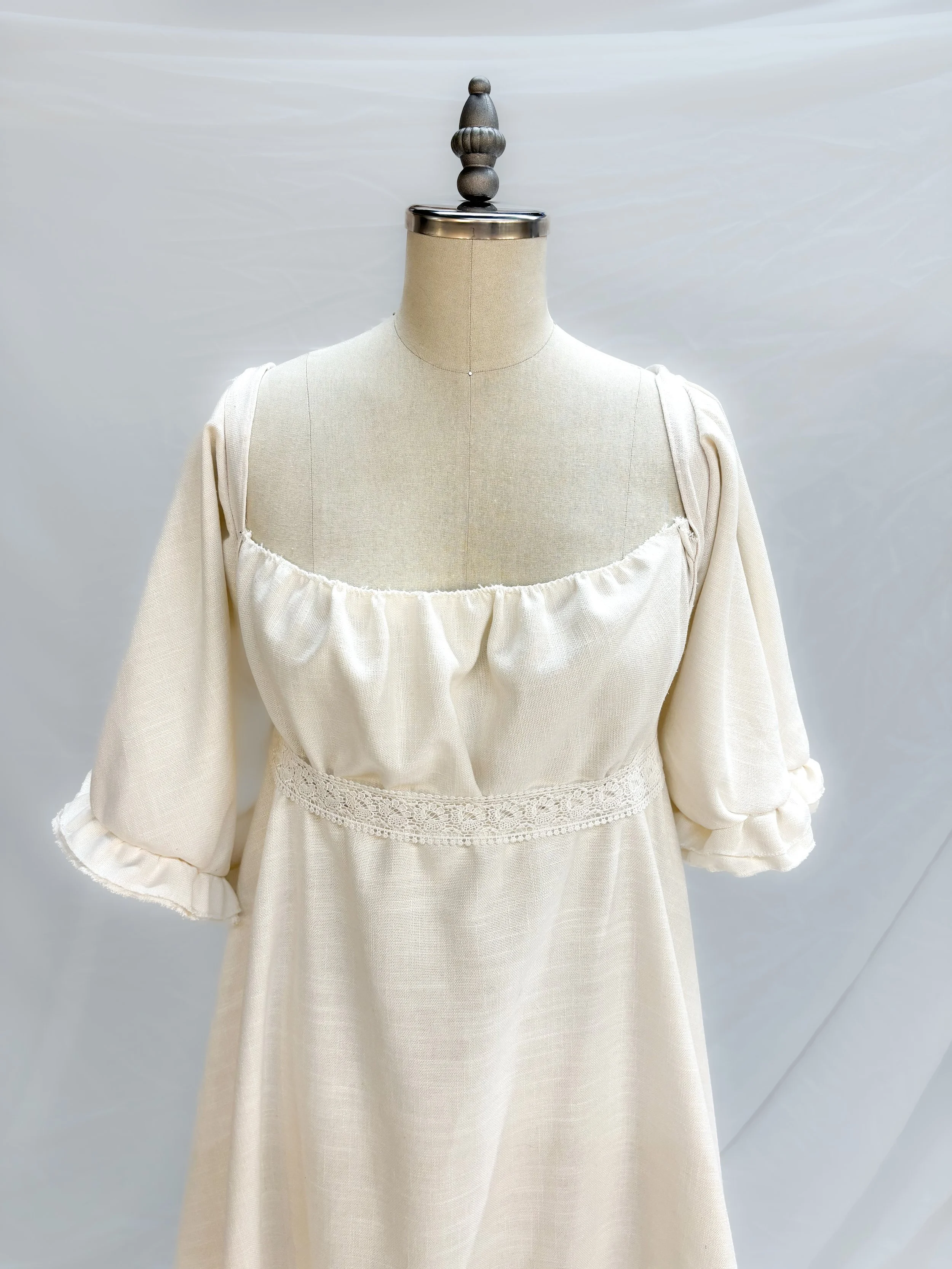 A personal project of draping and construction based on an 1812 cotton linen evening gown.