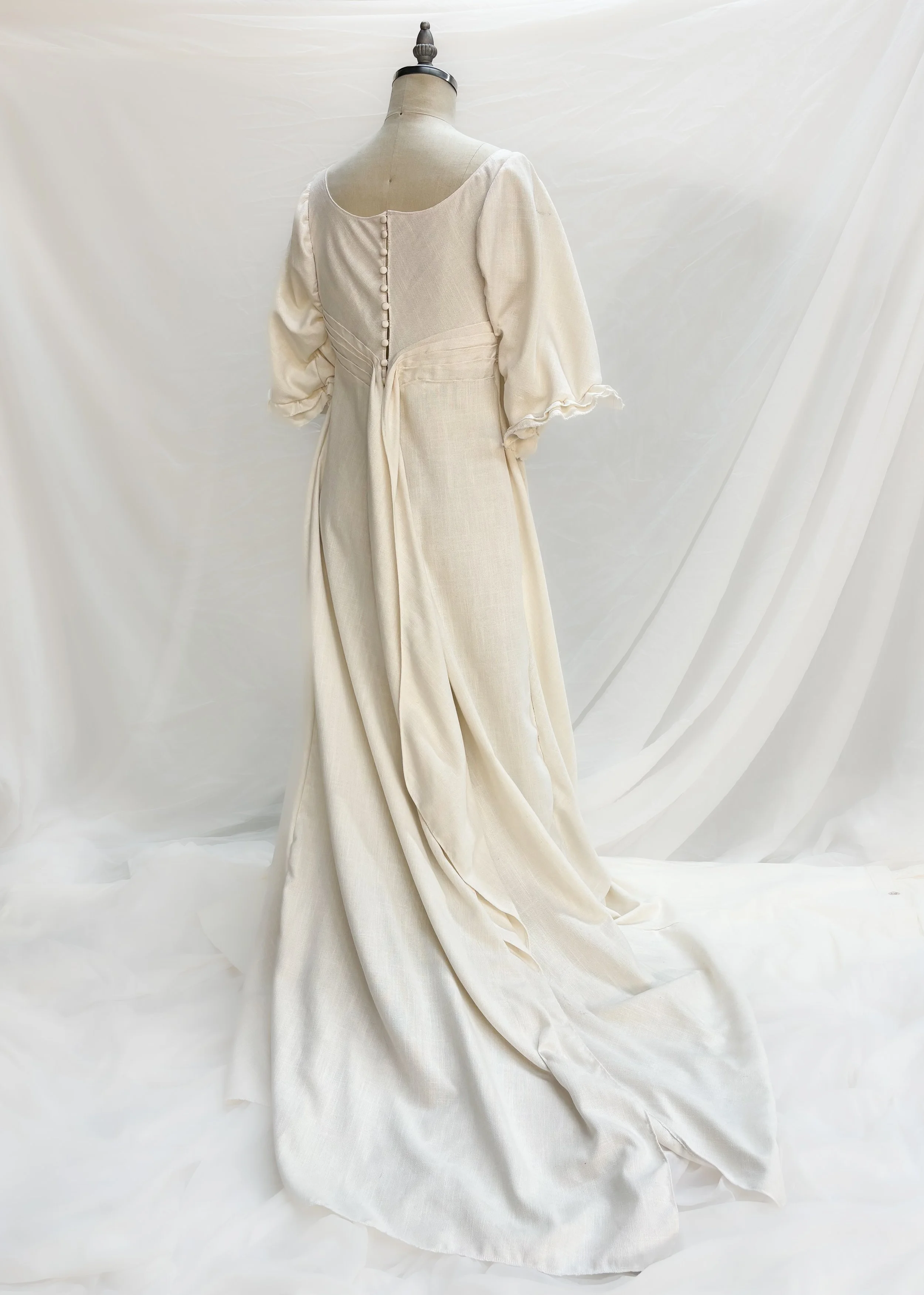 A personal project of draping and construction based on an 1812 cotton linen evening gown.