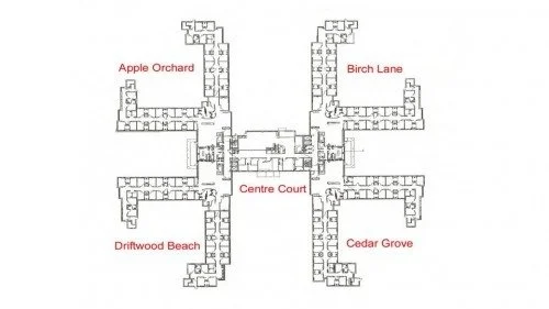 A building layout map showing five labeled areas: Apple Orchard, Birch Lane, Centre Court, Driftwood Beach, and Cedar Grove.