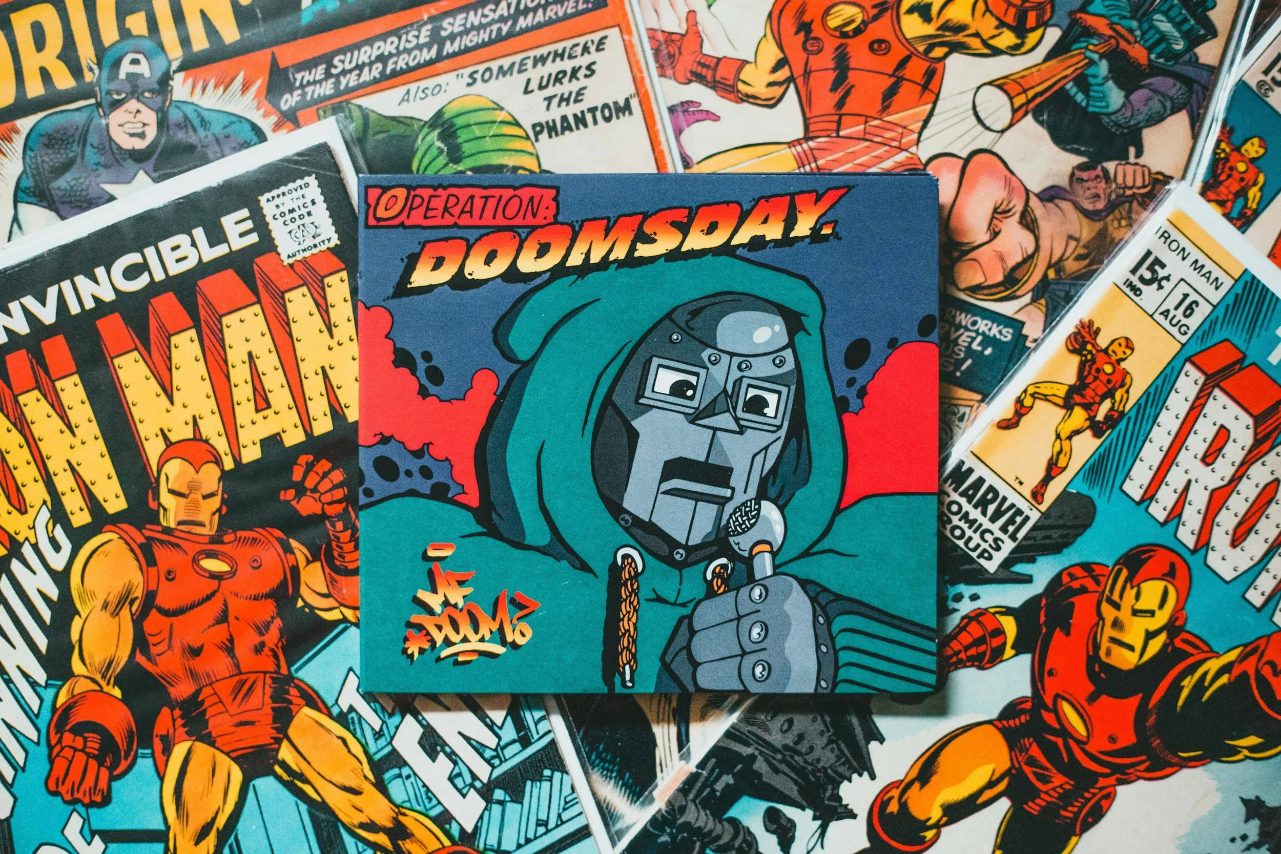 A collection of vintage Marvel comic book covers featuring superheroes such as Iron Man, Captain America, Thor, and Hulk, with bright colors and action scenes.
