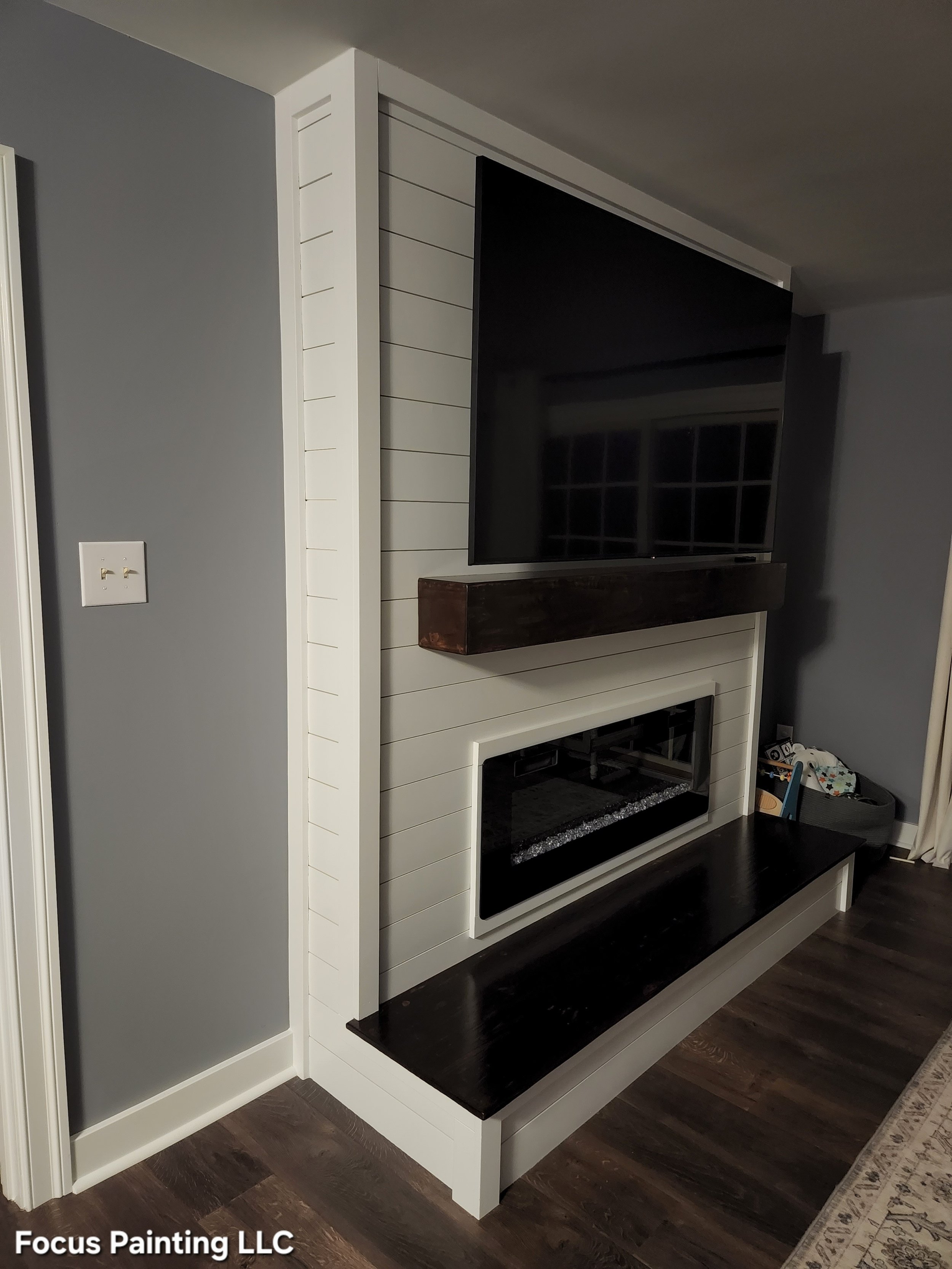 Beautiful electric fireplace built in by Focus Painting in Bowie, Maryland