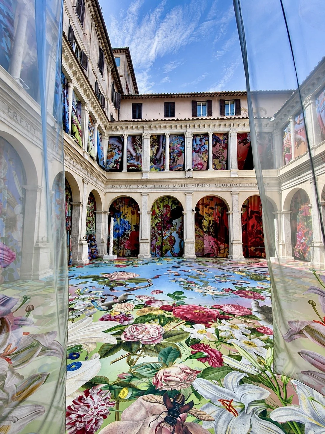 Temple of Flowers, immersive installation by Austin Young in the courtyard of Chiostro del Bramante, Rome.