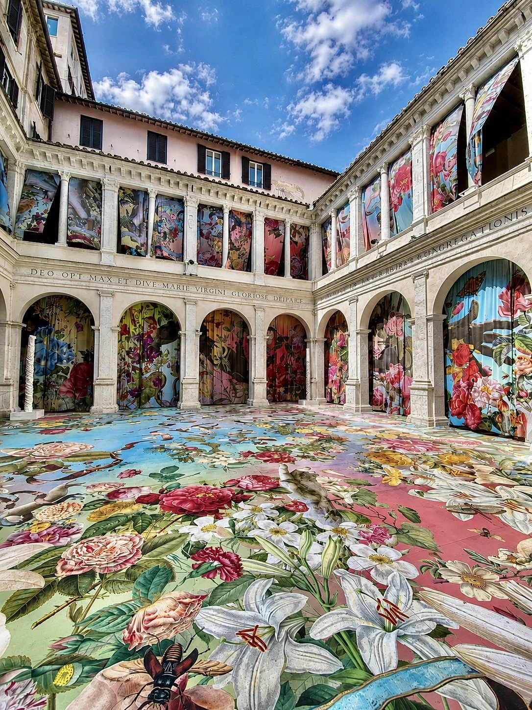 Temple of Flowers, immersive installation by Austin Young in the courtyard of Chiostro del Bramante, Rome.