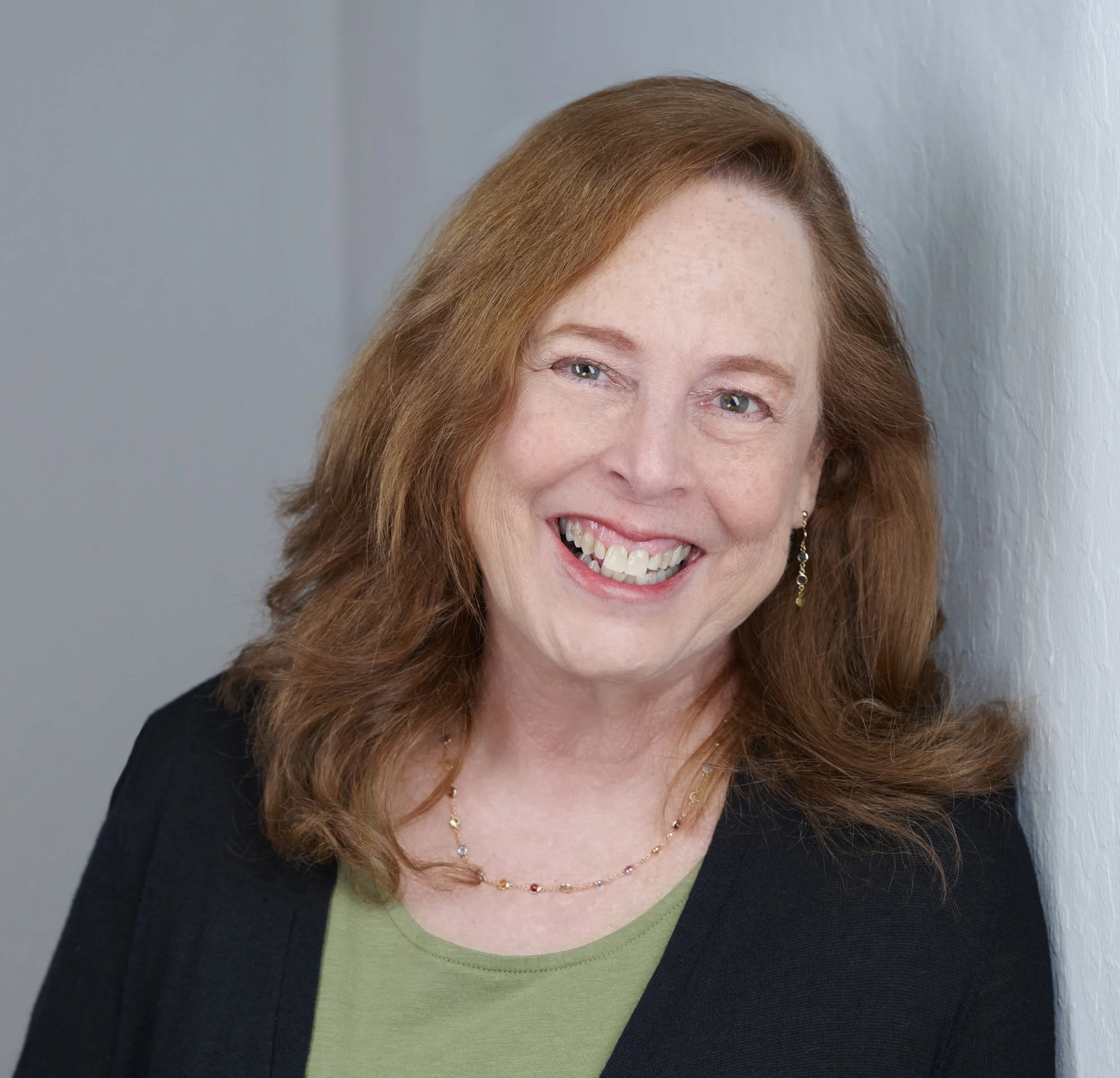Baker_Leslie-head shot Green.jpg