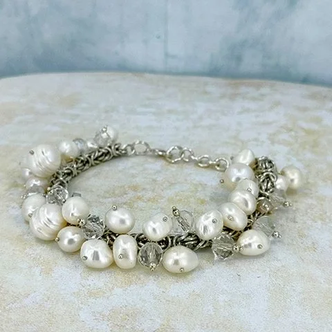 Modern Romance : : fancy pearl and silver chain bracelet