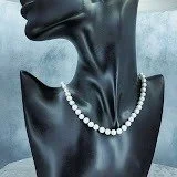 Sirlin Hall Jewelry Tucson Pearl necklace (on a form) "ON HIS MIND"
