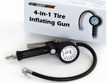Tire inflating gun with pressure gauge and air chuck next to its packaging