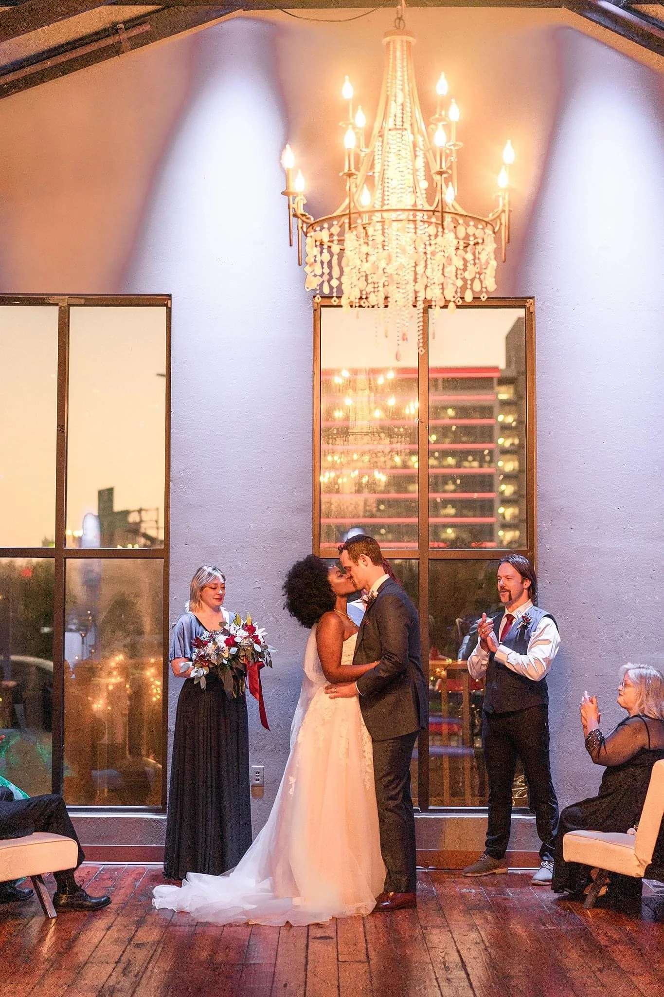 Couple kissing at a wedding ceremony at Twenty Seven Event Venue in downtown Little Rock Arkansas