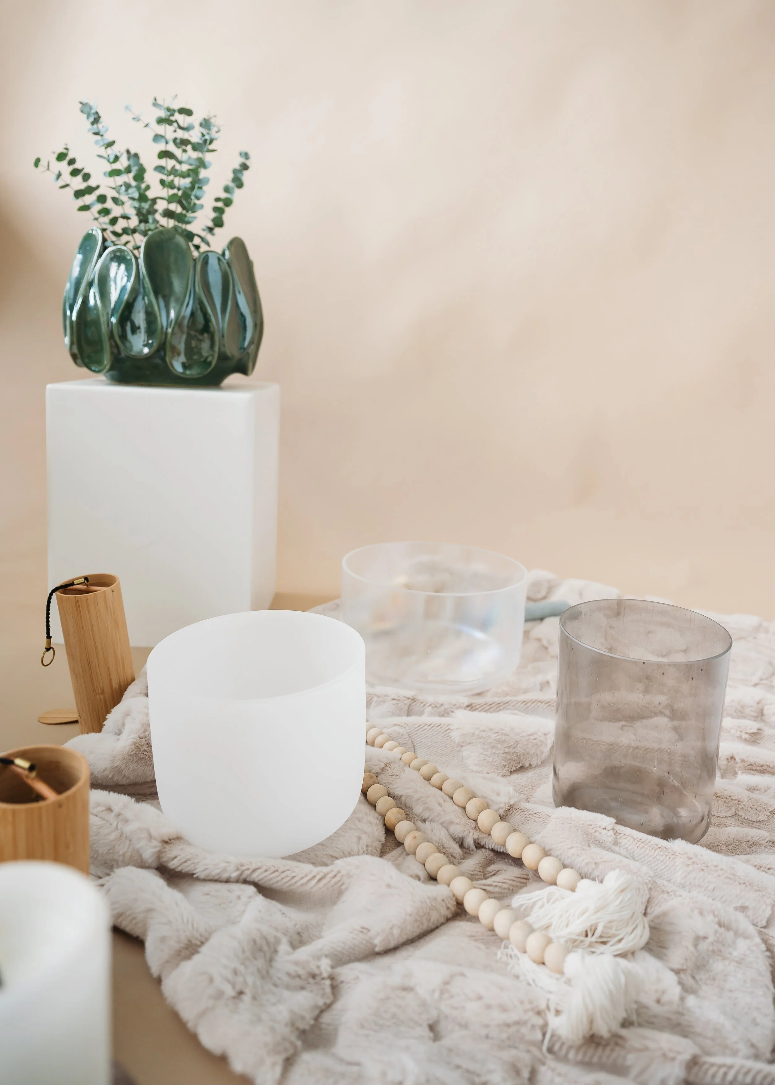 Crystal singing bowls arranged for a restorative sound meditation.