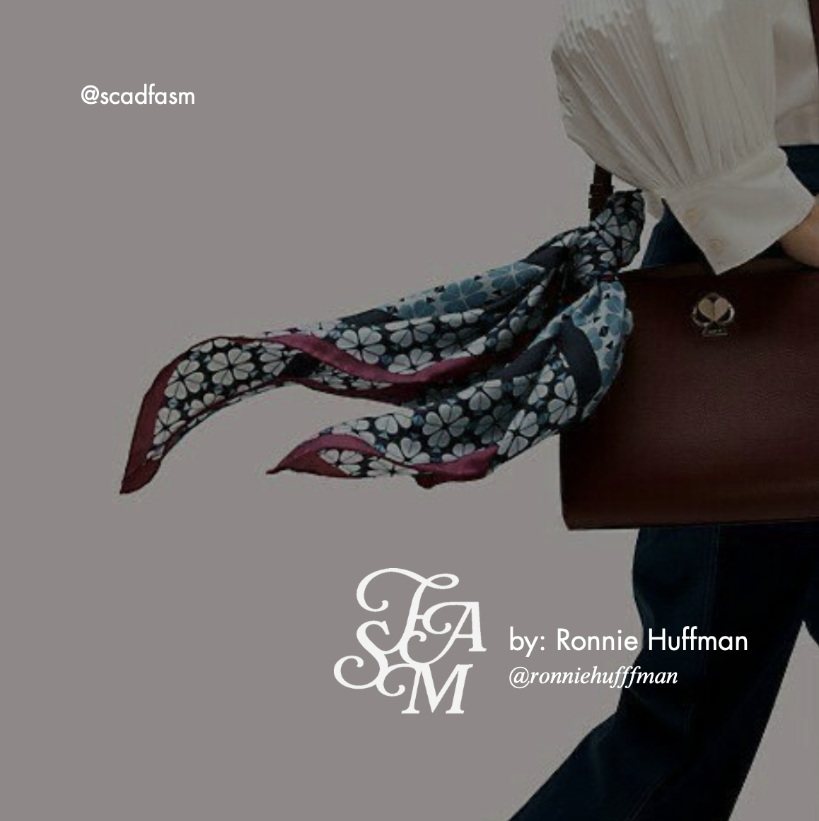 Person in a white blouse carrying a brown leather handbag and wearing a blue floral scarf